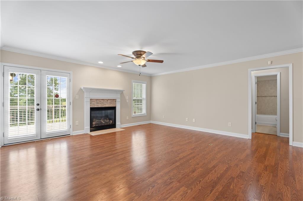2531 Slate Road King, NC 27021 - Photo 8 of 40 Living room with gas logs- walk out to deck