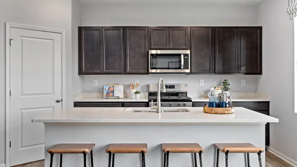 a kitchen with a cabinets and appliances