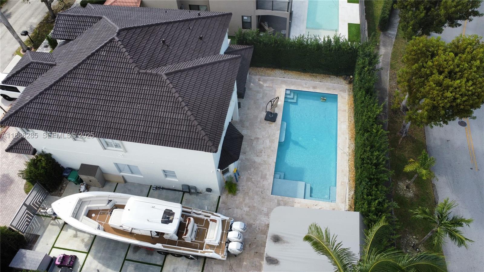 16411 Southwest 60th Terrace Miami, FL 33193 - Photo 23 of 37 an aerial view of a house with a yard and furniture
