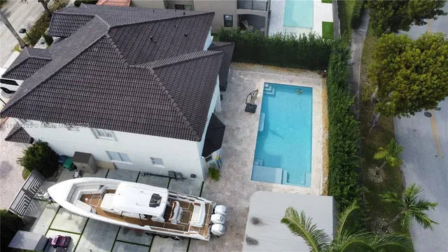 a view of a pool with a patio