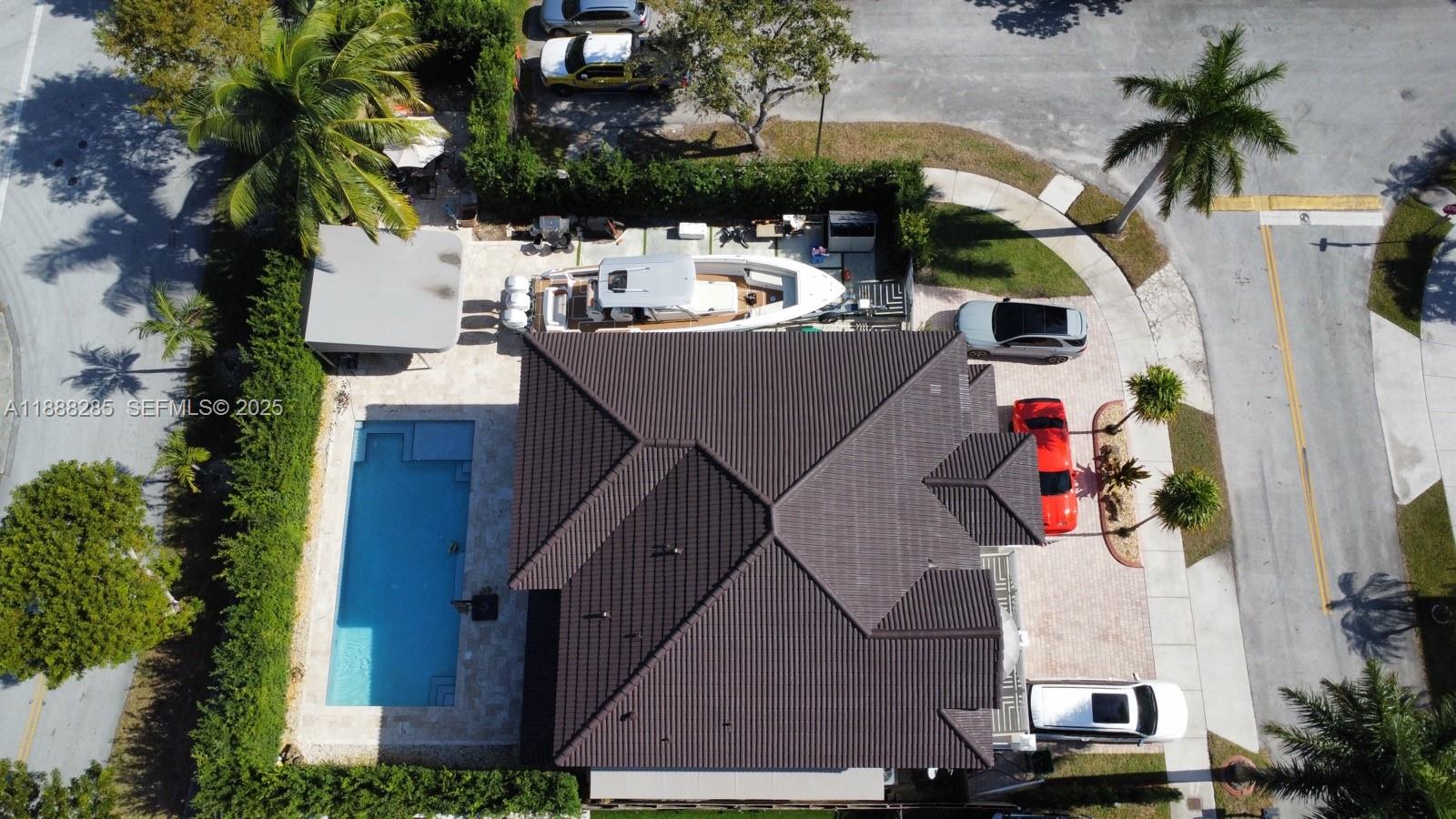 16411 Southwest 60th Terrace Miami, FL 33193 - Photo 37 of 37 an aerial view of a house with a swimming pool