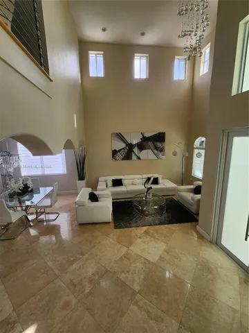 a bed room with furniture and a window