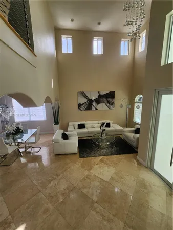 a bed room with furniture and a window