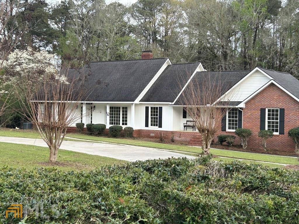 2306 Peacock Drive Dublin, GA 31021 - Photo 1 of 1 a view of house with outdoor space and sitting area