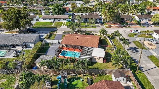 an aerial view of a city with lots of residential buildings