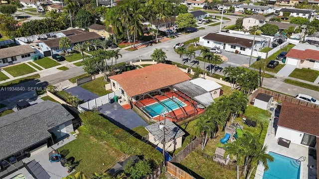 a view of houses with yard