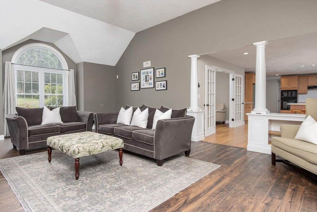3 Integrity Way Groton, MA 01450 - Photo 15 of 42 a living room with furniture and a large window