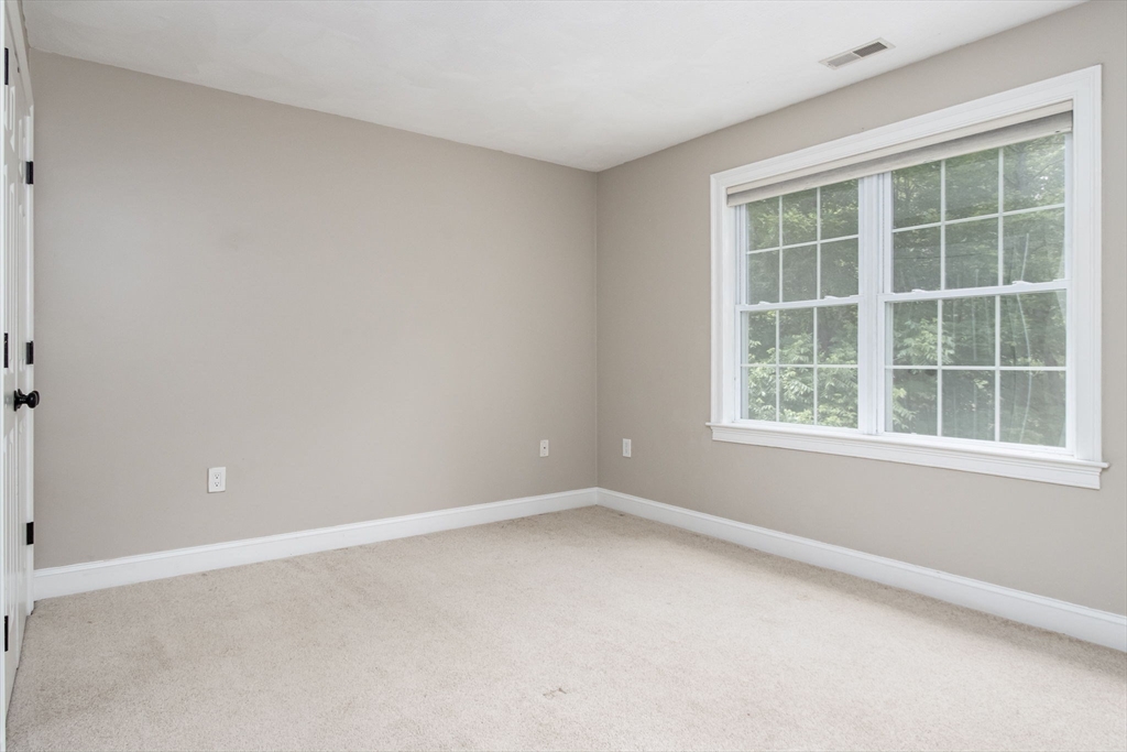 3 Integrity Way Groton, MA 01450 - Photo 29 of 42 an empty room with a window