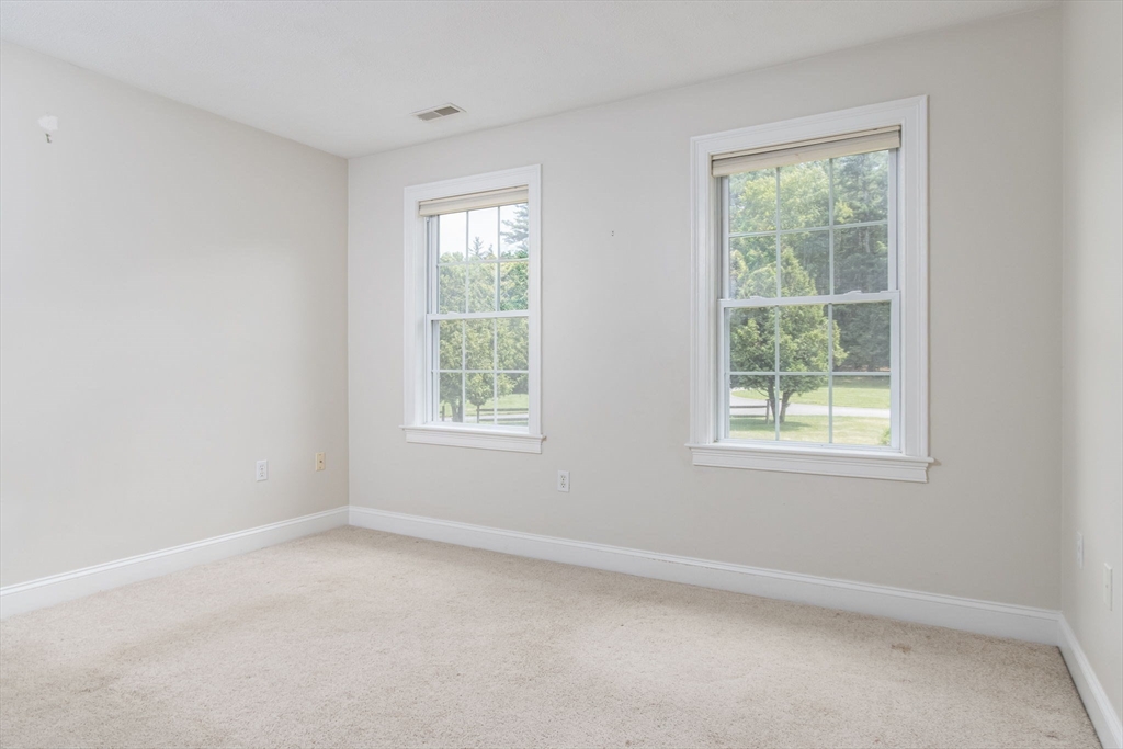 3 Integrity Way Groton, MA 01450 - Photo 30 of 42 an empty room with a window