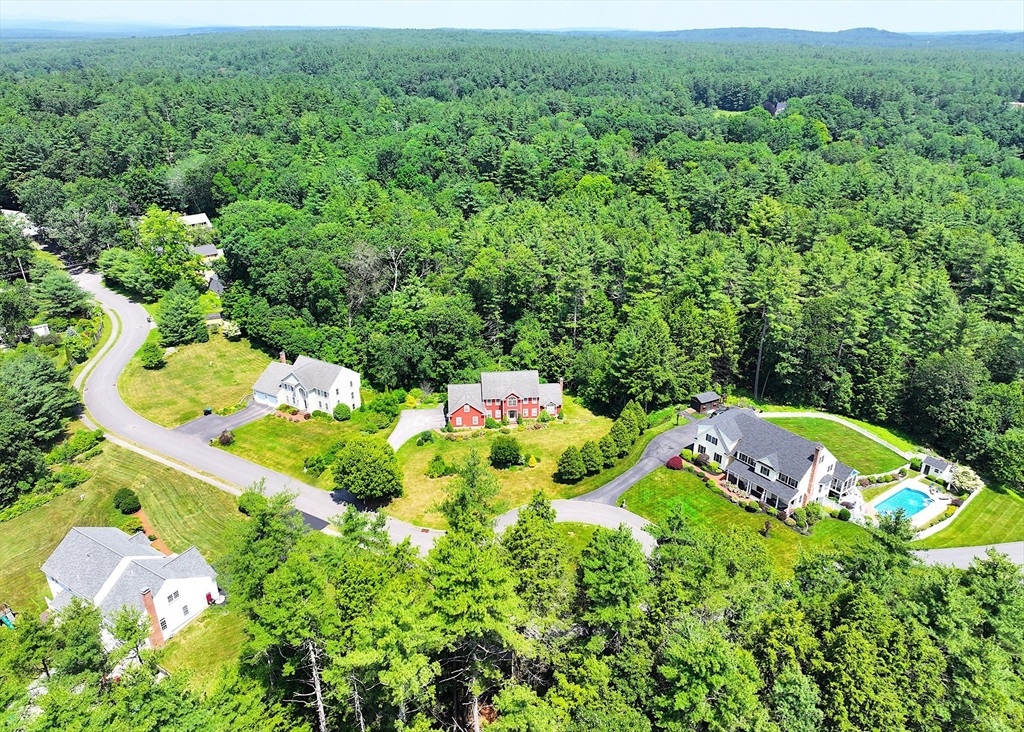 3 Integrity Way Groton, MA 01450 - Photo 3 of 42 an aerial view of a house with a yard