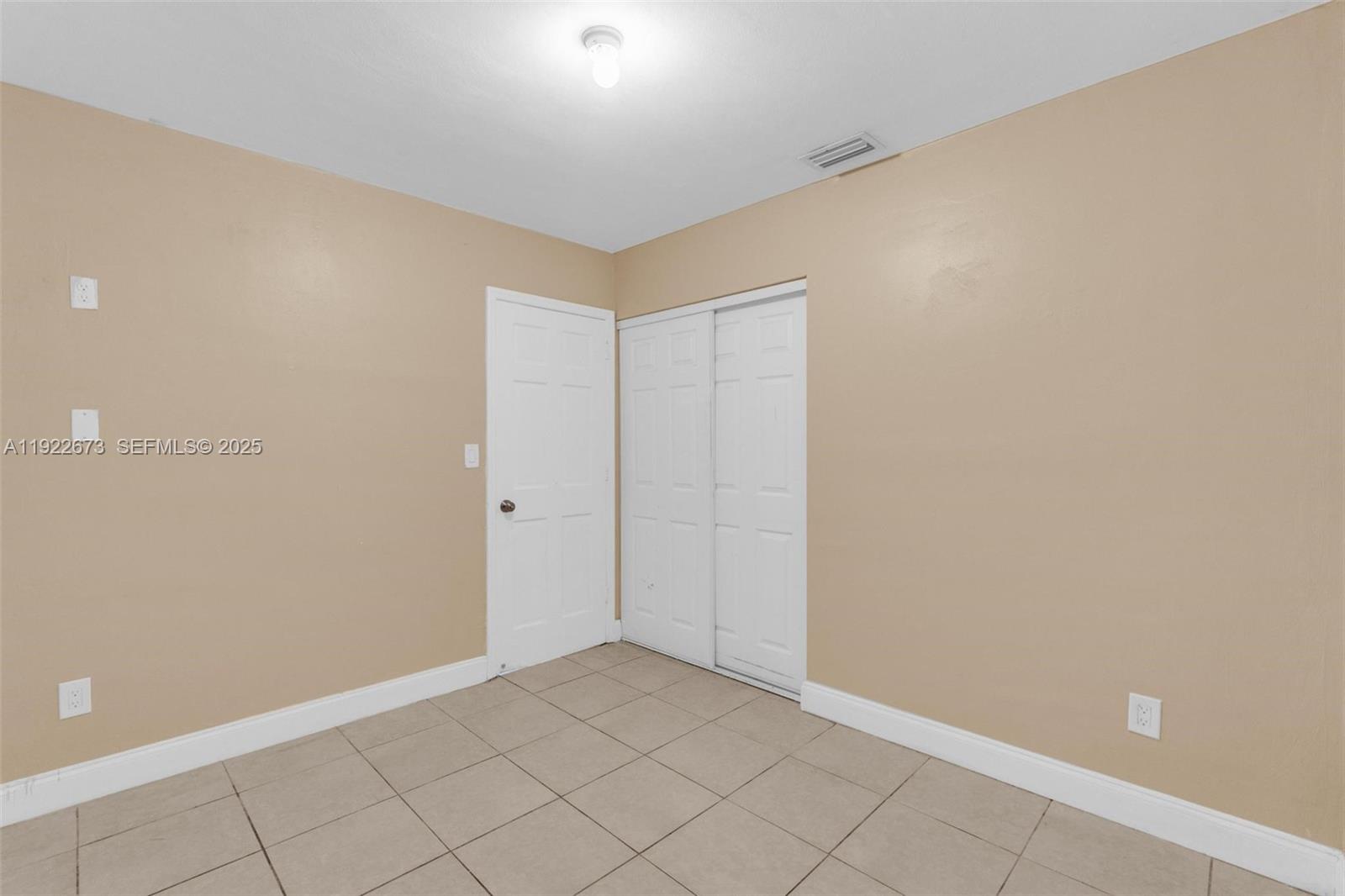 10220 Southwest 178th Street, Unit 10220 Miami, FL 33157 - Photo 13 of 25 a view of an empty room