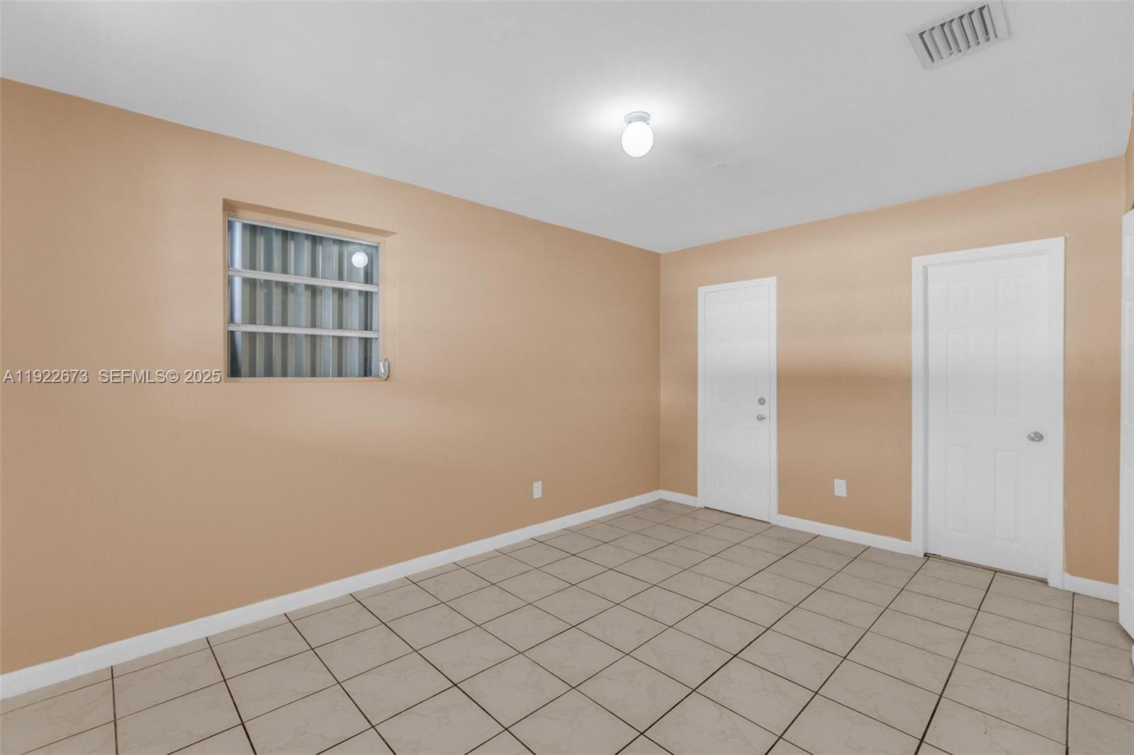 10220 Southwest 178th Street, Unit 10220 Miami, FL 33157 - Photo 16 of 25 a view of an empty room