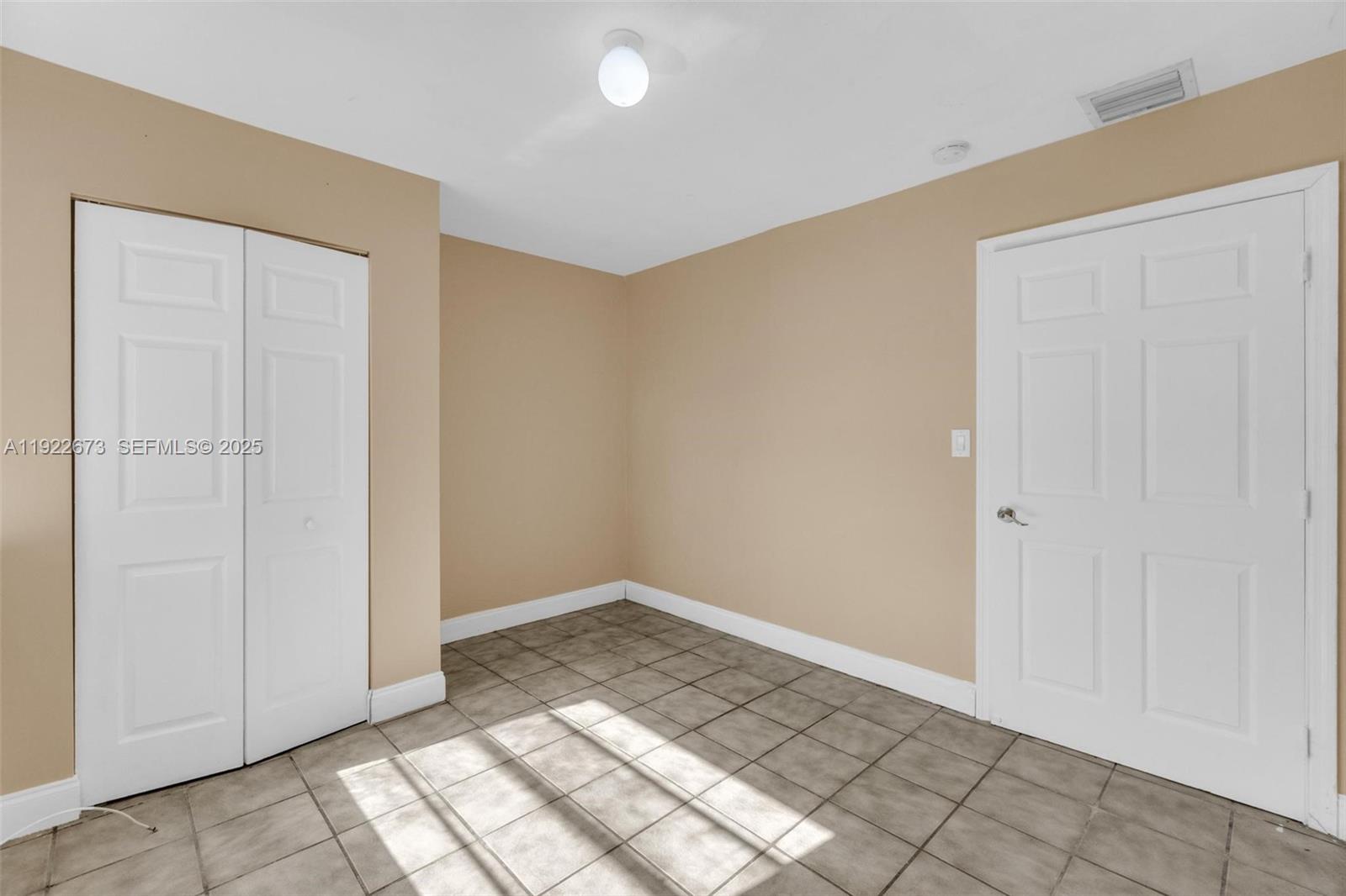10220 Southwest 178th Street, Unit 10220 Miami, FL 33157 - Photo 25 of 25 a view of an empty room