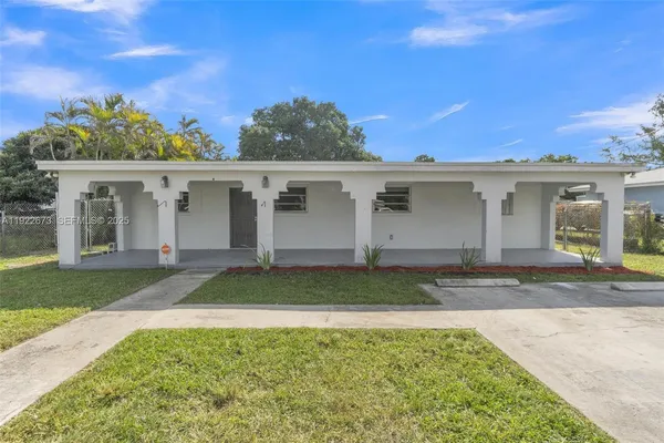 front view of house with a yard