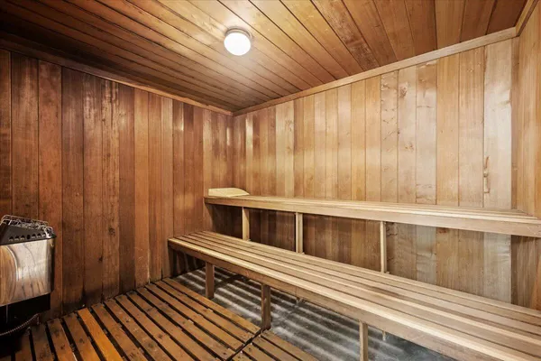 a view of wooden floor and a window