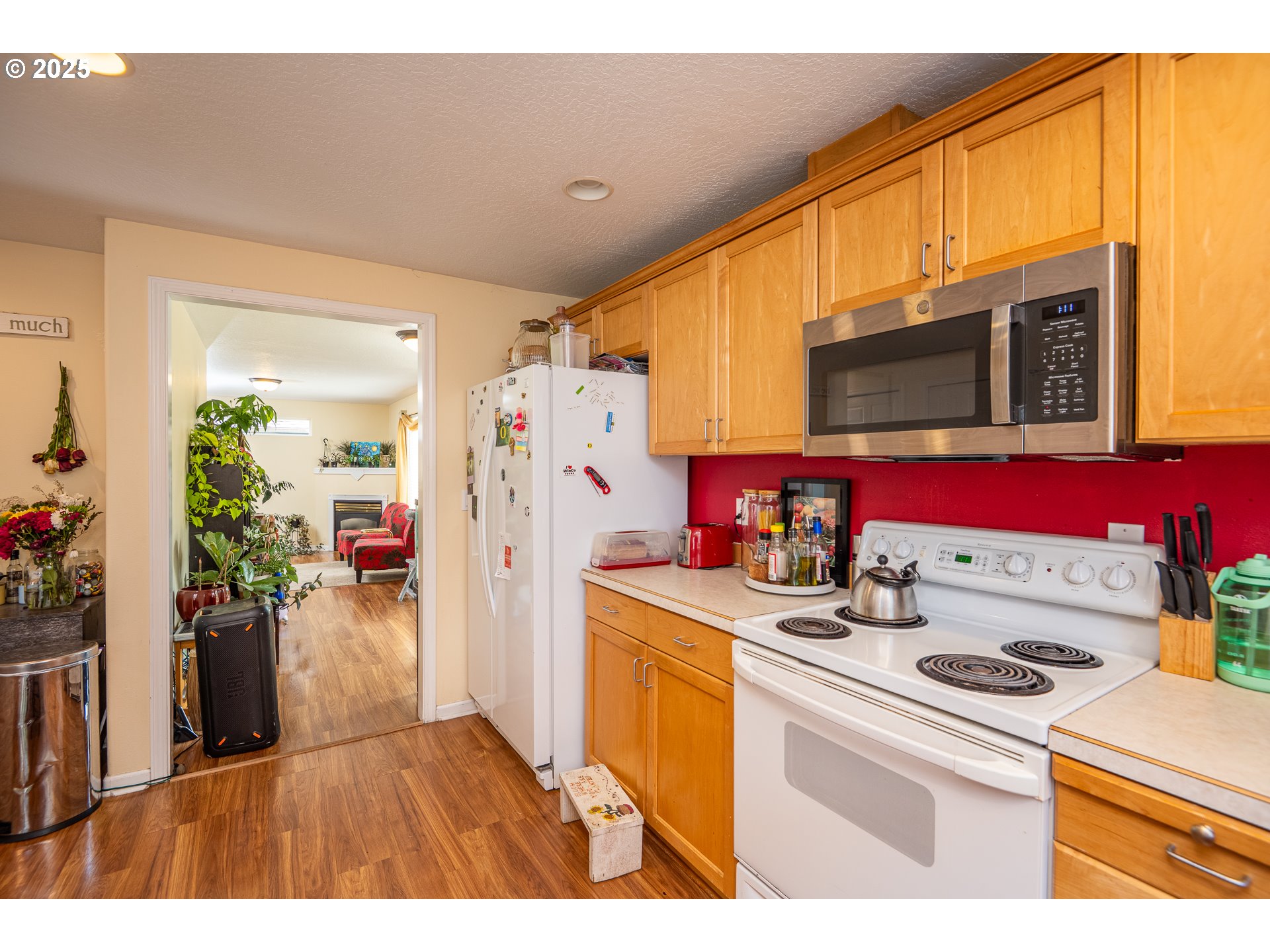 4217 Cole Way Springfield, OR 97478 - Photo 12 of 43 a kitchen with a refrigerator and a stove