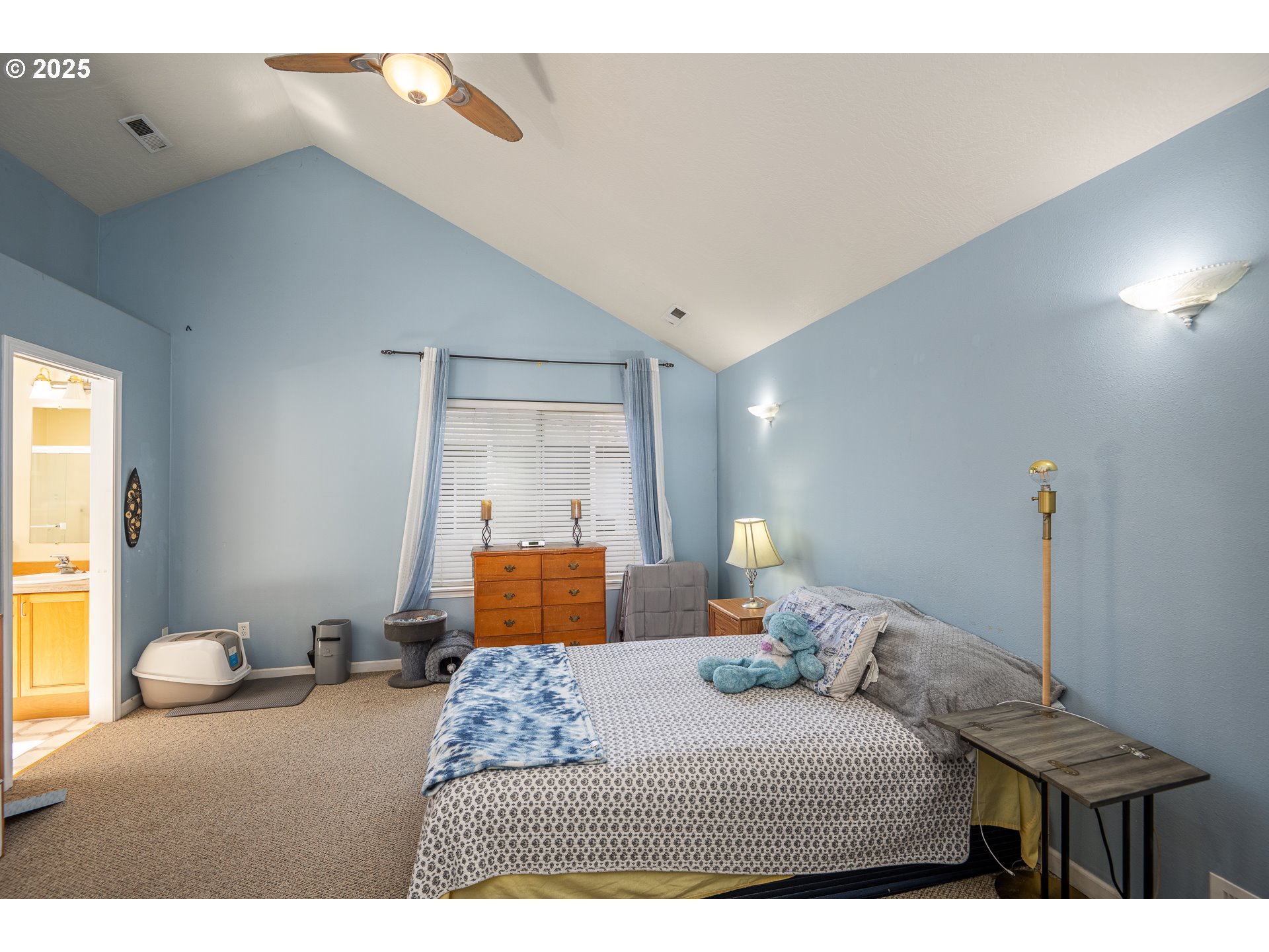 4217 Cole Way Springfield, OR 97478 - Photo 16 of 43 a bedroom with a bed and a night stand