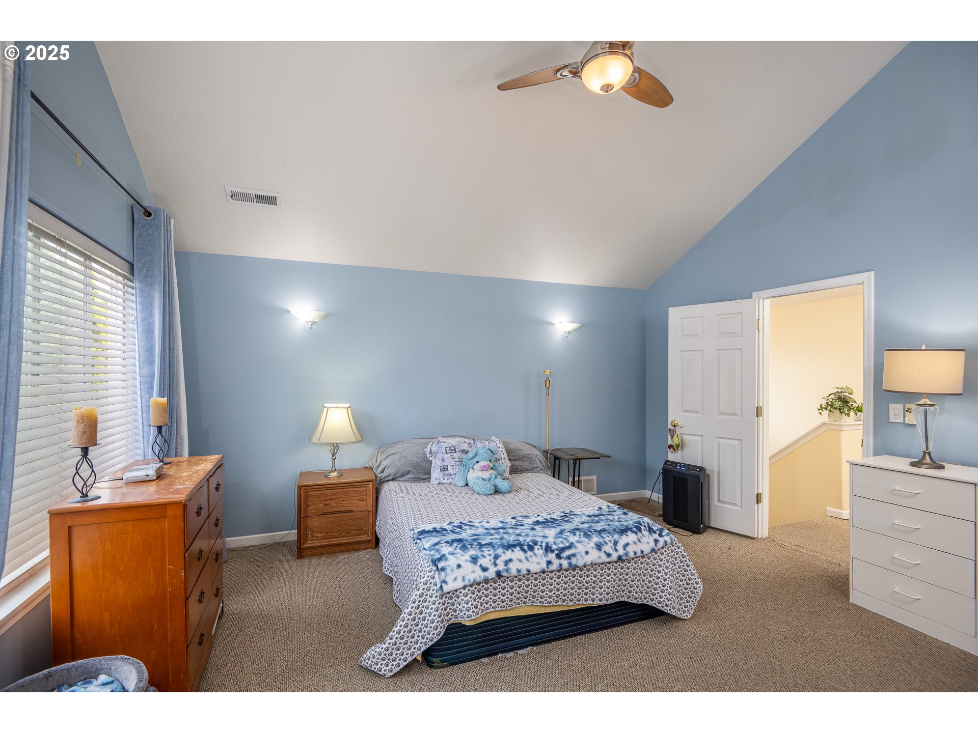 4217 Cole Way Springfield, OR 97478 - Photo 18 of 43 a bedroom with a bed and dresser with mirror