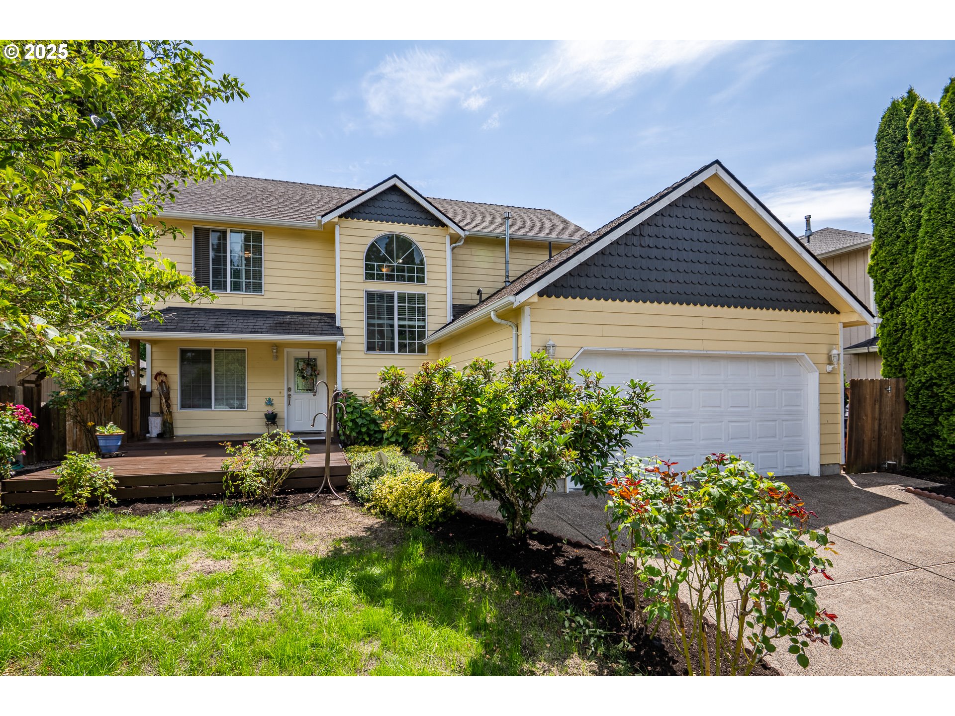 4217 Cole Way Springfield, OR 97478 - Photo 2 of 43 a front view of a house with a yard and outdoor seating
