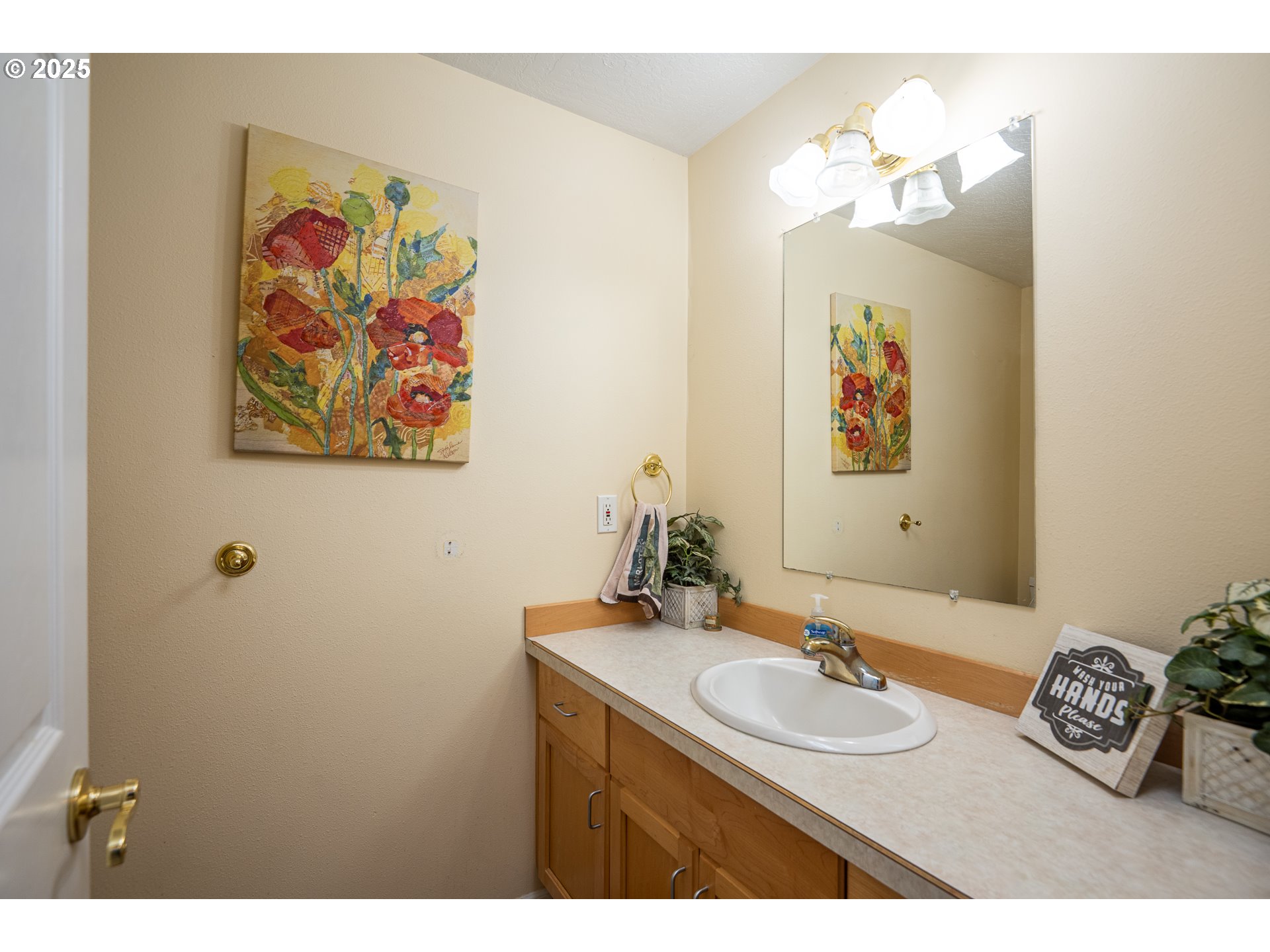 4217 Cole Way Springfield, OR 97478 - Photo 29 of 43 a bathroom with a sink mirror and vanity
