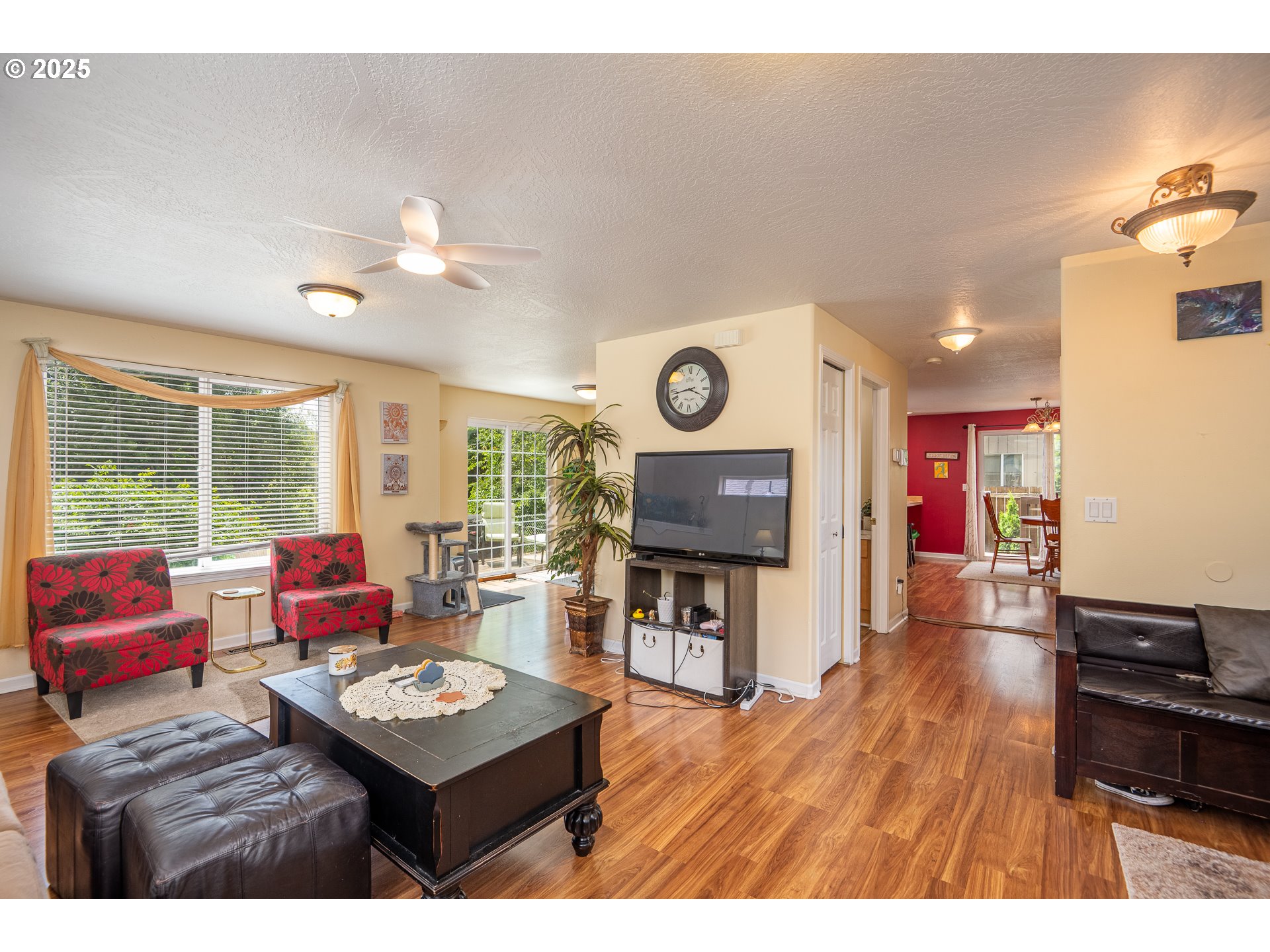 4217 Cole Way Springfield, OR 97478 - Photo 7 of 43 a living room with furniture and a flat screen tv