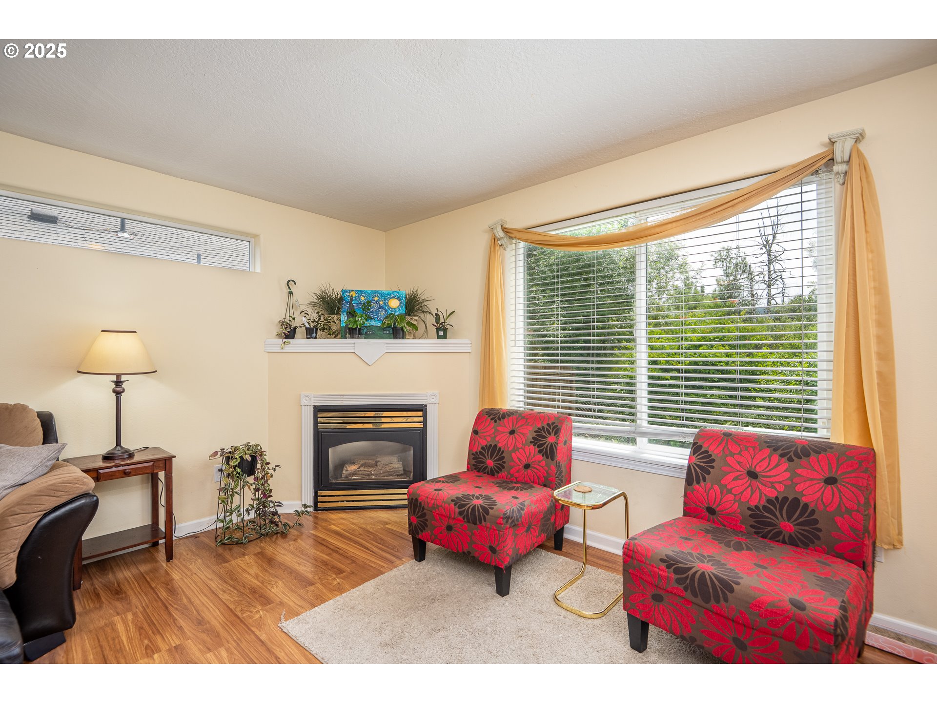 4217 Cole Way Springfield, OR 97478 - Photo 8 of 43 a bedroom with furniture and a fireplace