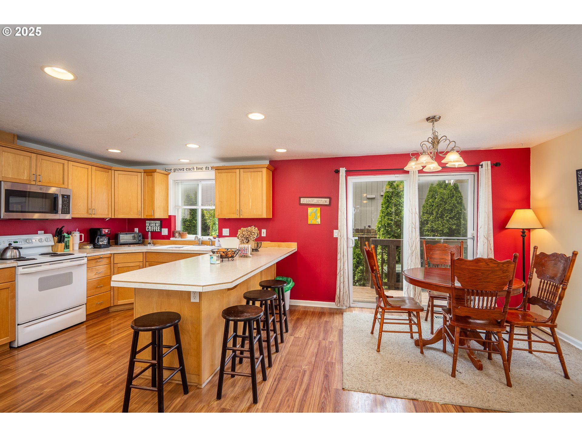 4217 Cole Way Springfield, OR 97478 - Photo 10 of 43 a view of a dining room with furniture window and wooden floor