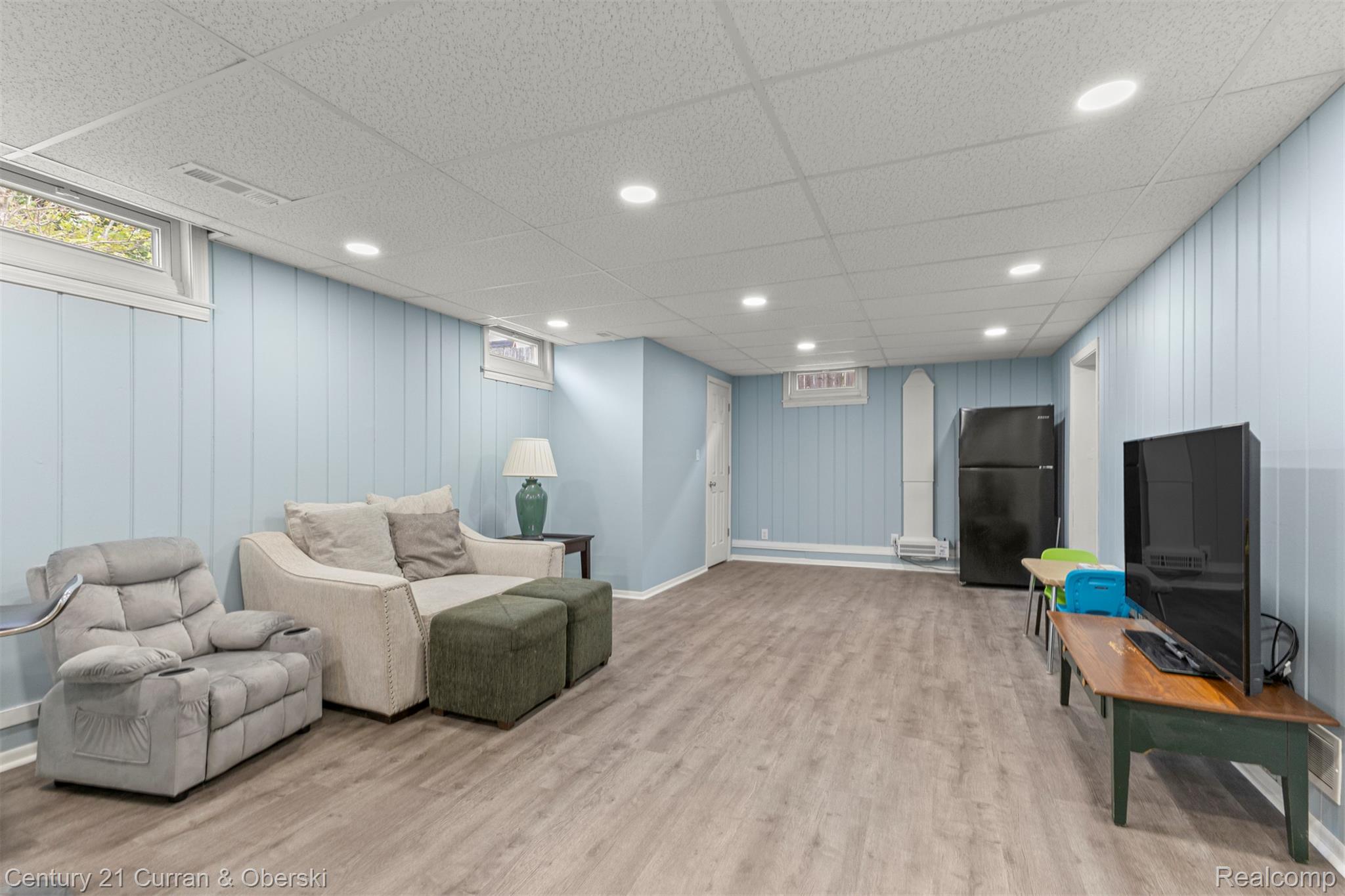 411 South Adrian Street Tecumseh, MI 49286 - Photo 33 of 61 Living room featuring a drop ceiling, light wood-style floors, and recessed lighting