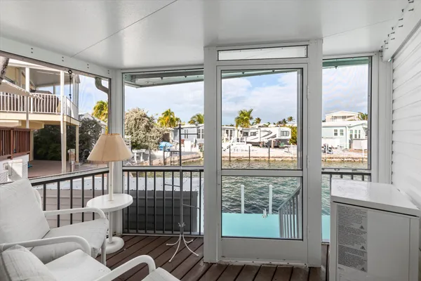 a living room with large windows