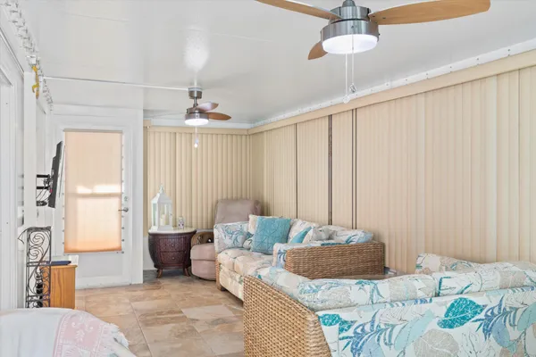 a bedroom with furniture and a large bed