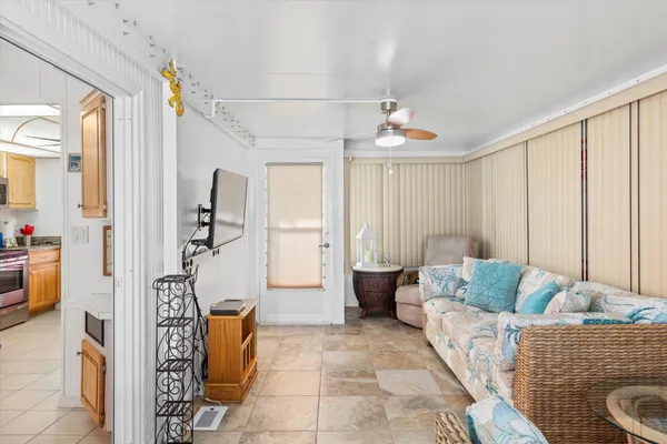 a living room with furniture and a table