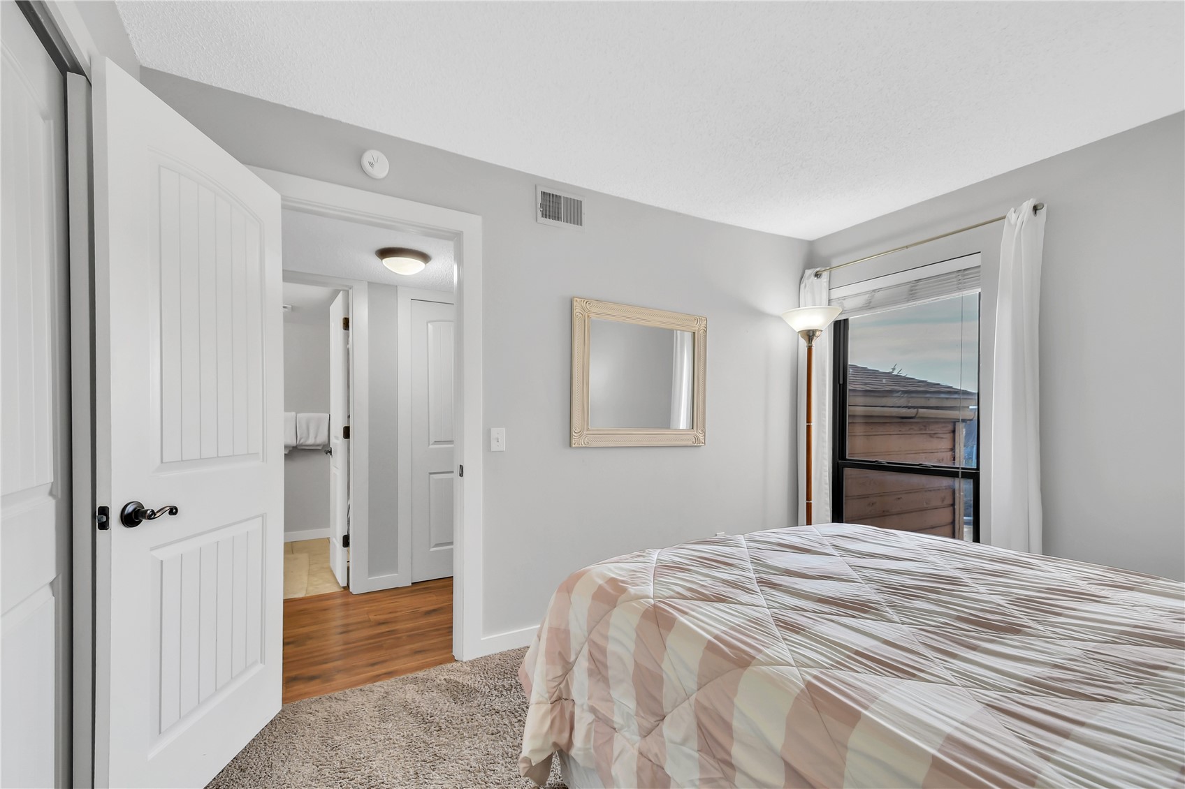 2710 Ryan Gulch Road, Unit 2731 Silverthorne, CO 80498 - Photo 18 of 39 a bedroom with a bed and a closet