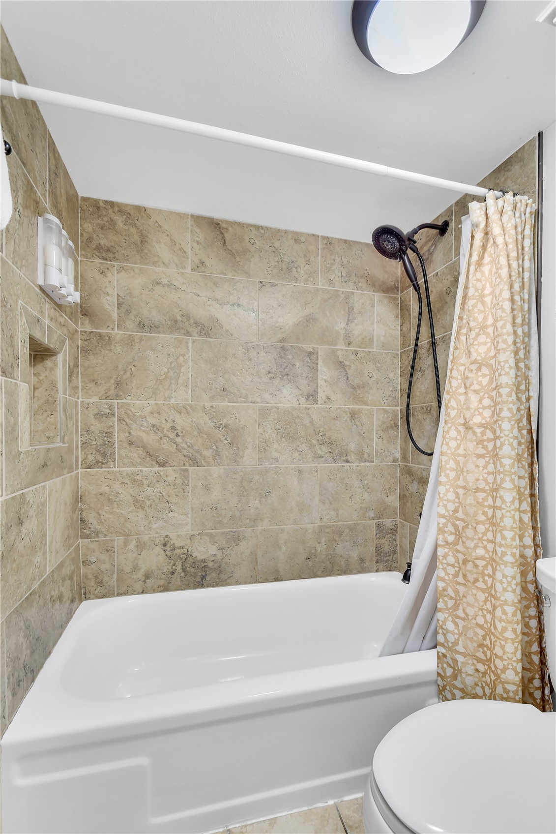 2710 Ryan Gulch Road, Unit 2731 Silverthorne, CO 80498 - Photo 24 of 39 a bathroom with a toilet and a bath tub