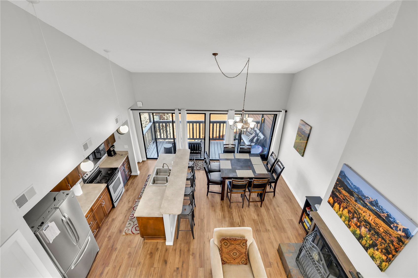 2710 Ryan Gulch Road, Unit 2731 Silverthorne, CO 80498 - Photo 30 of 39 a living room with furniture and a wooden floor