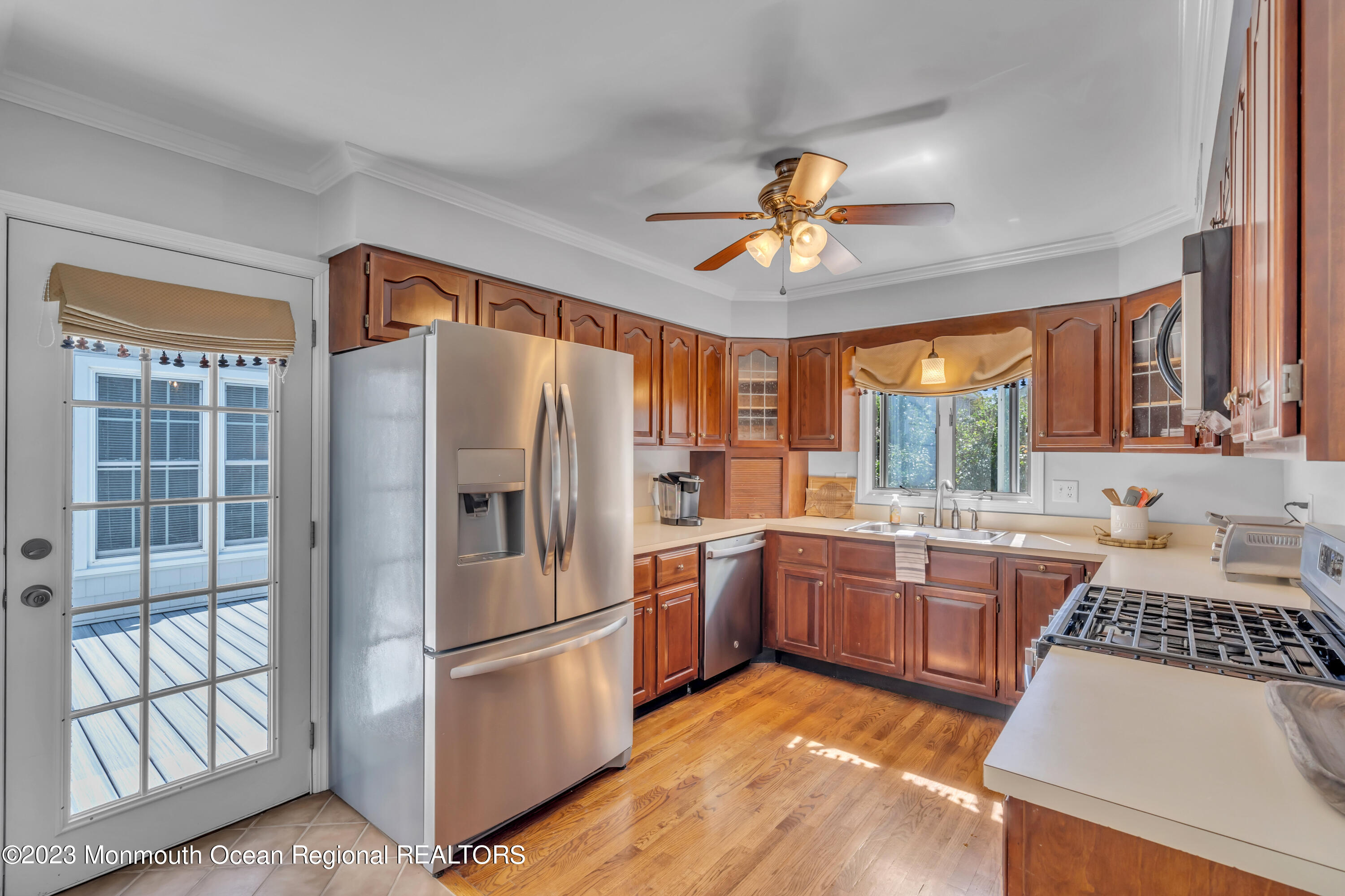 608 Brielle Avenue Brielle, NJ 08730 - Photo 15 of 56 a kitchen with stainless steel appliances granite countertop a refrigerator a stove a sink and dishwasher