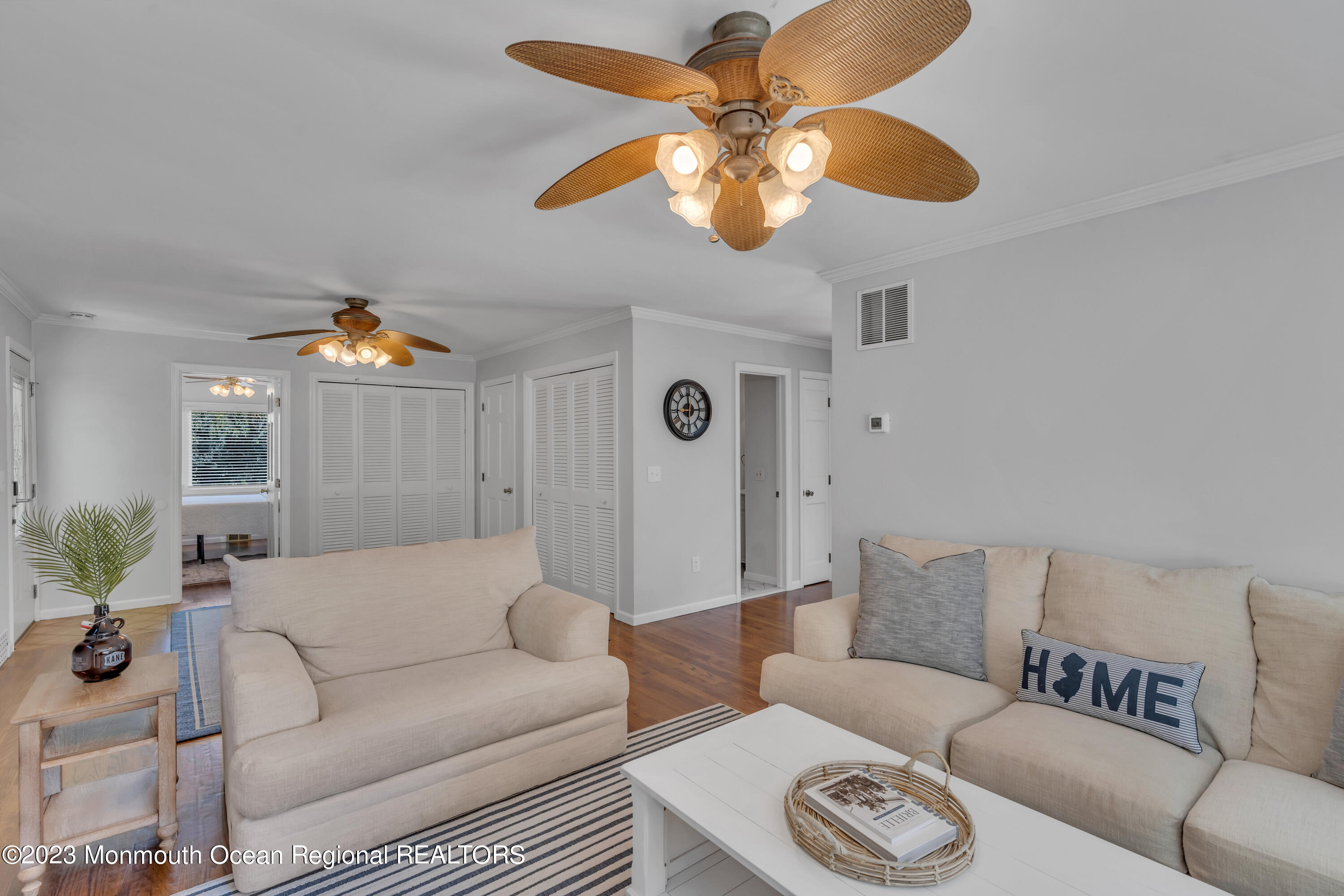 608 Brielle Avenue Brielle, NJ 08730 - Photo 16 of 56 a living room with furniture and a chandelier
