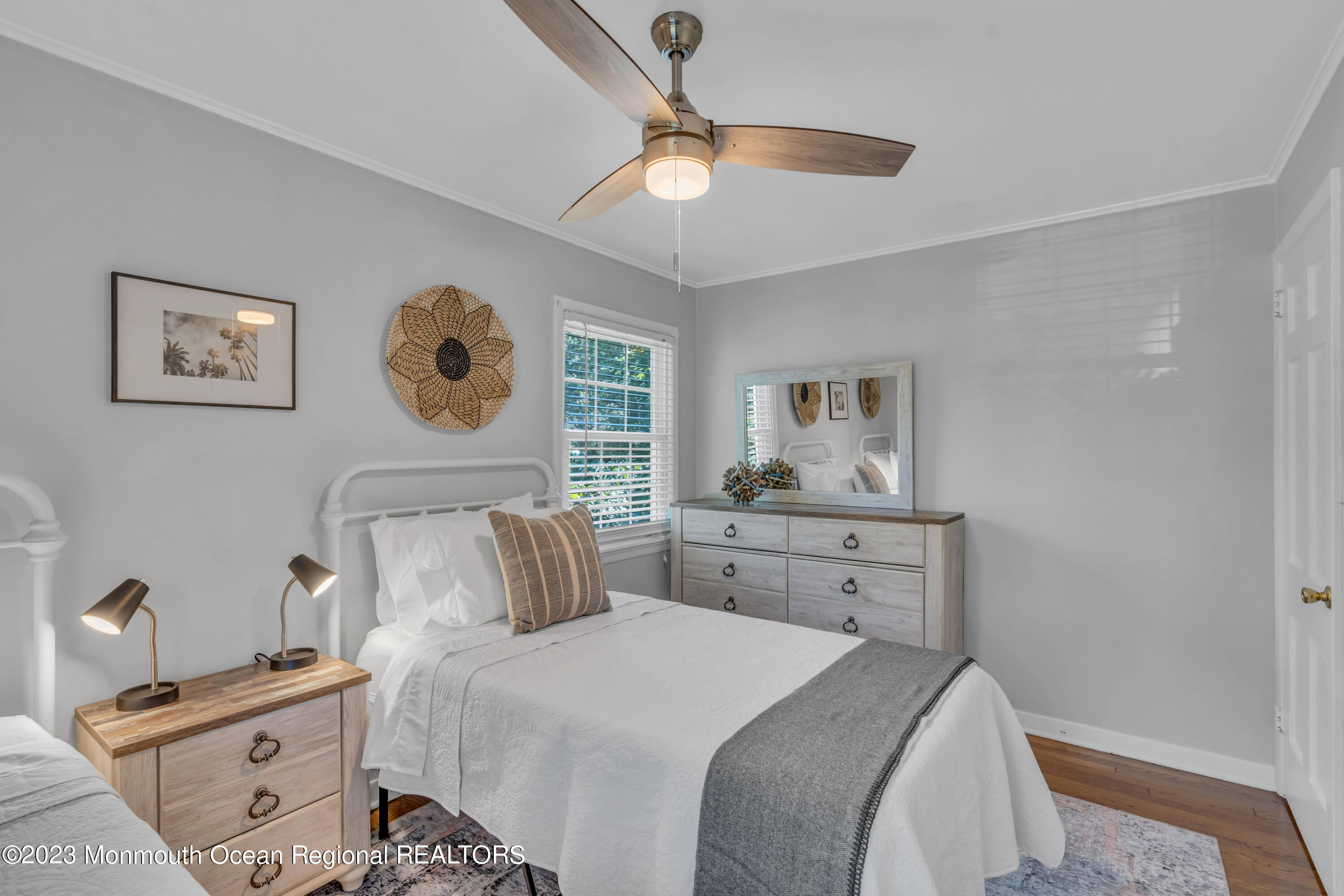 608 Brielle Avenue Brielle, NJ 08730 - Photo 24 of 56 a bedroom with a bed and a window