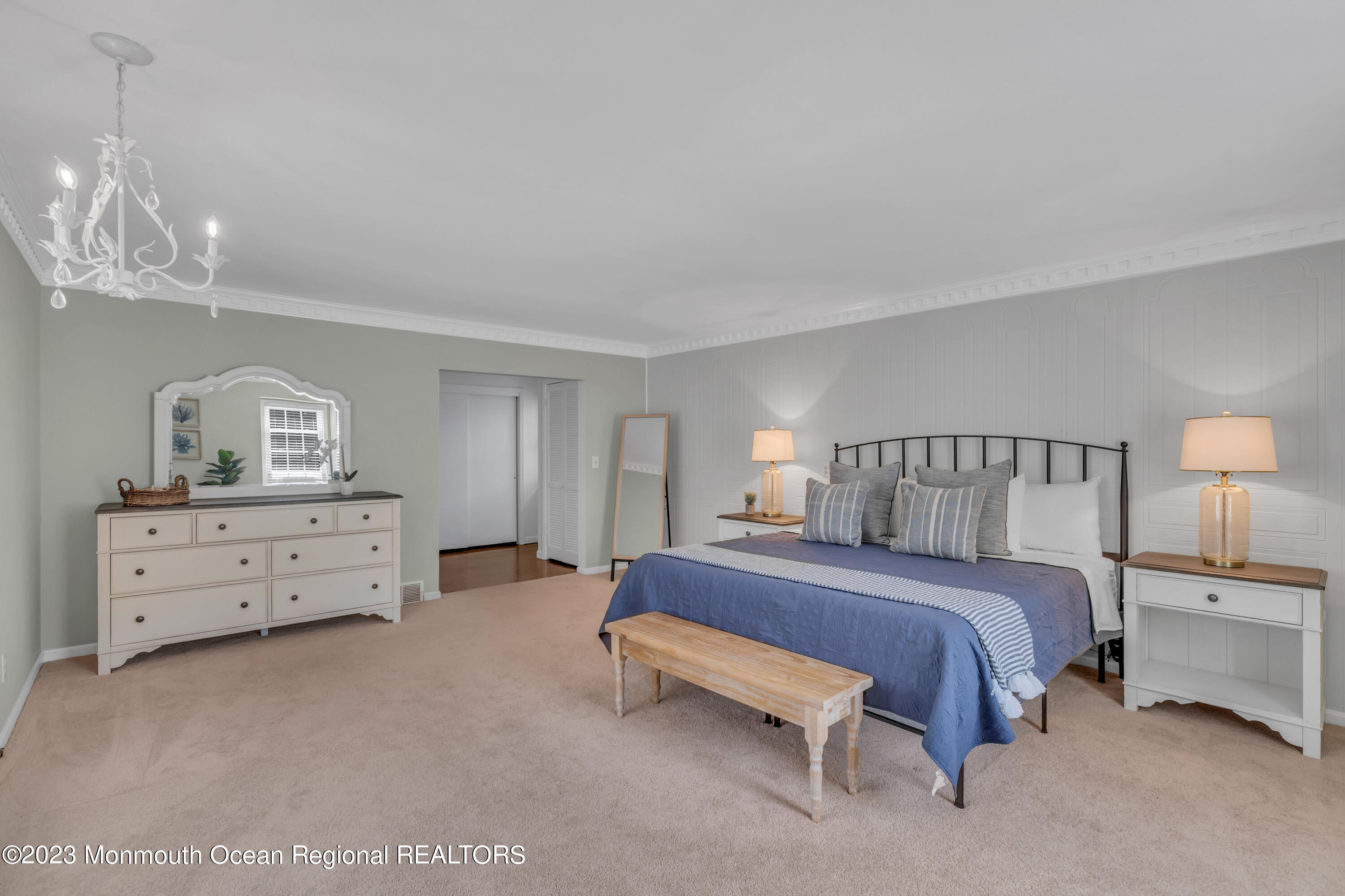 608 Brielle Avenue Brielle, NJ 08730 - Photo 28 of 56 a bedroom with a bed and a dresser
