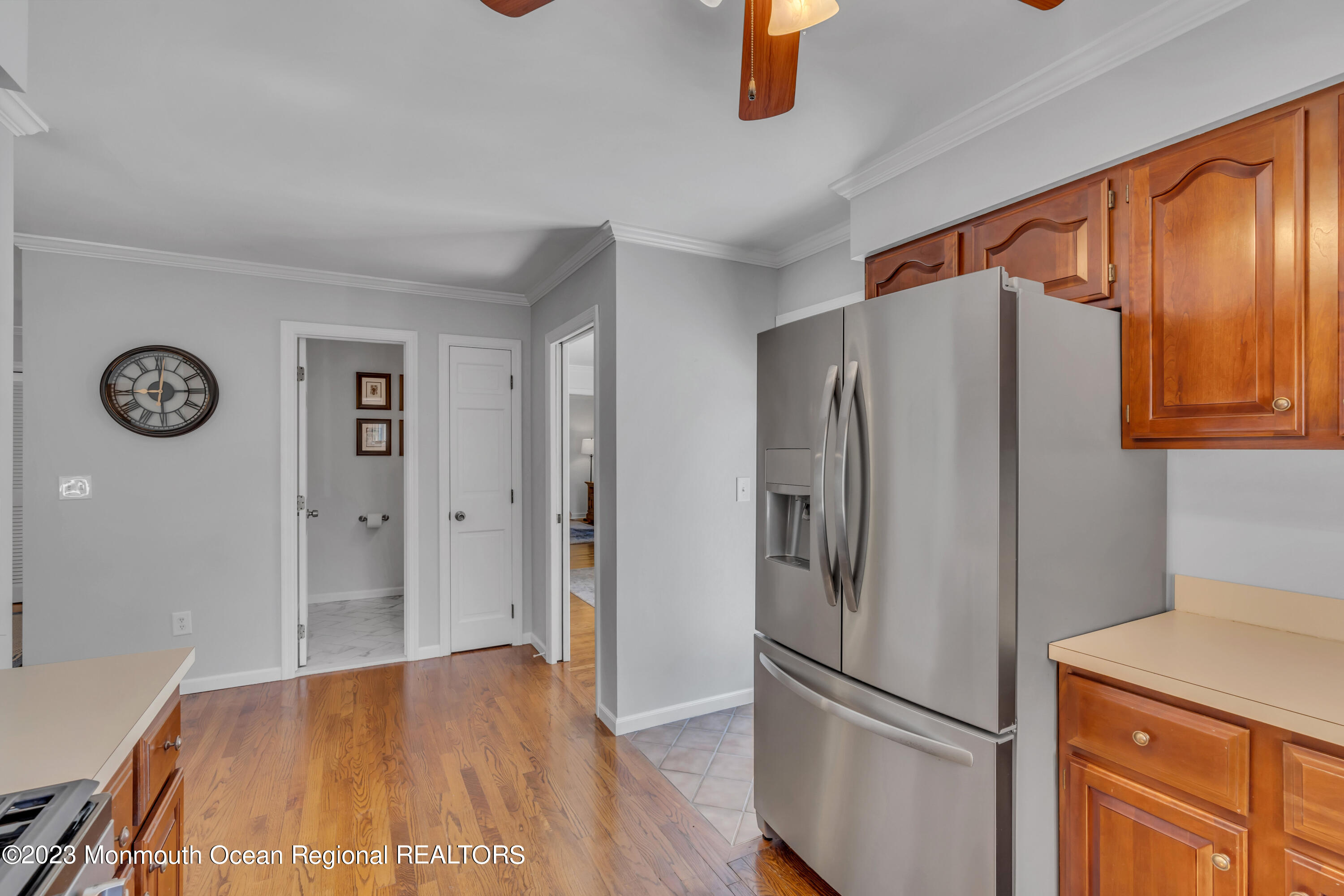 608 Brielle Avenue Brielle, NJ 08730 - Photo 29 of 56 a kitchen with stainless steel appliances granite countertop a refrigerator and a stove top oven