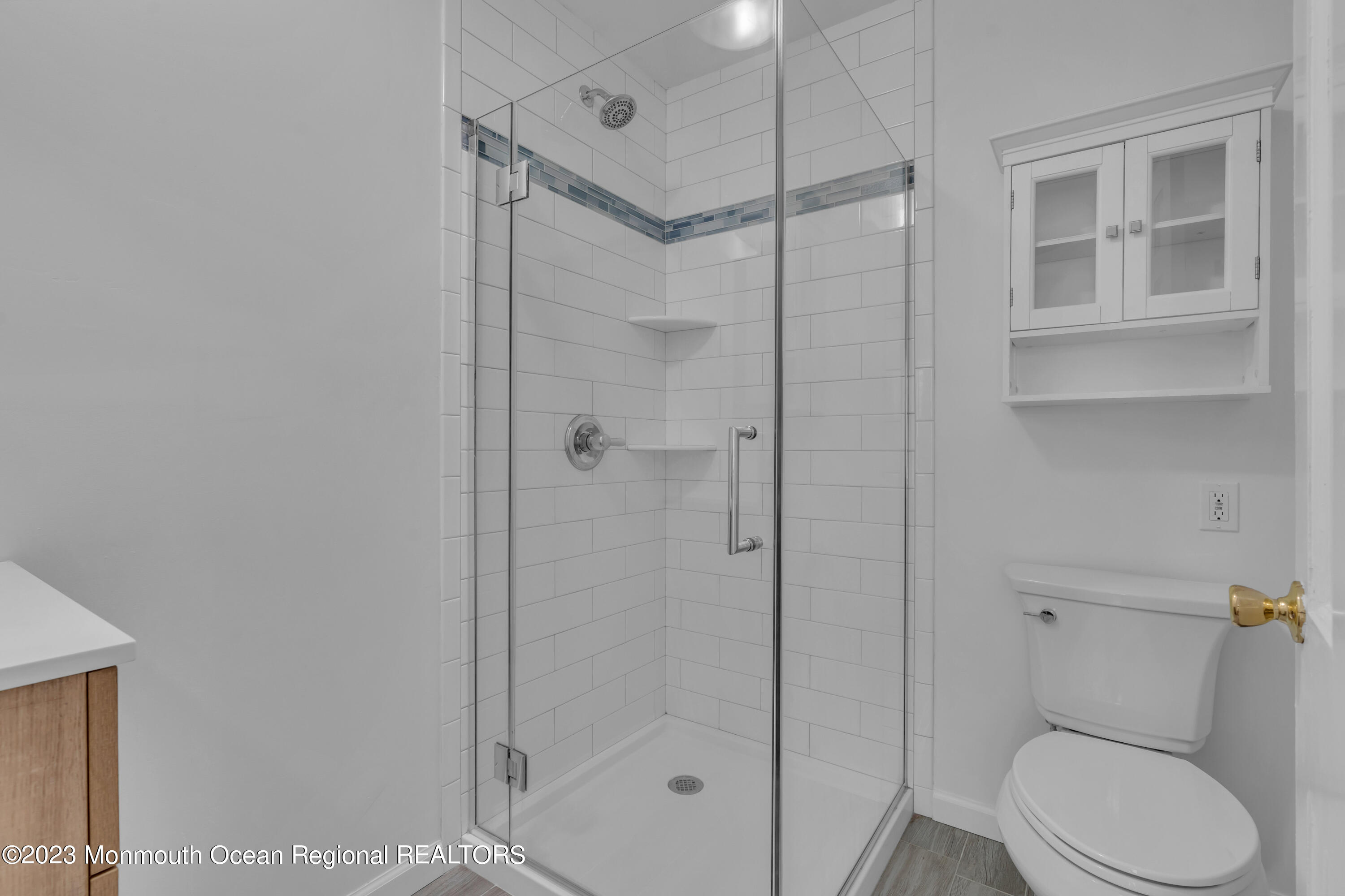 608 Brielle Avenue Brielle, NJ 08730 - Photo 31 of 56 a bathroom with a toilet and a shower