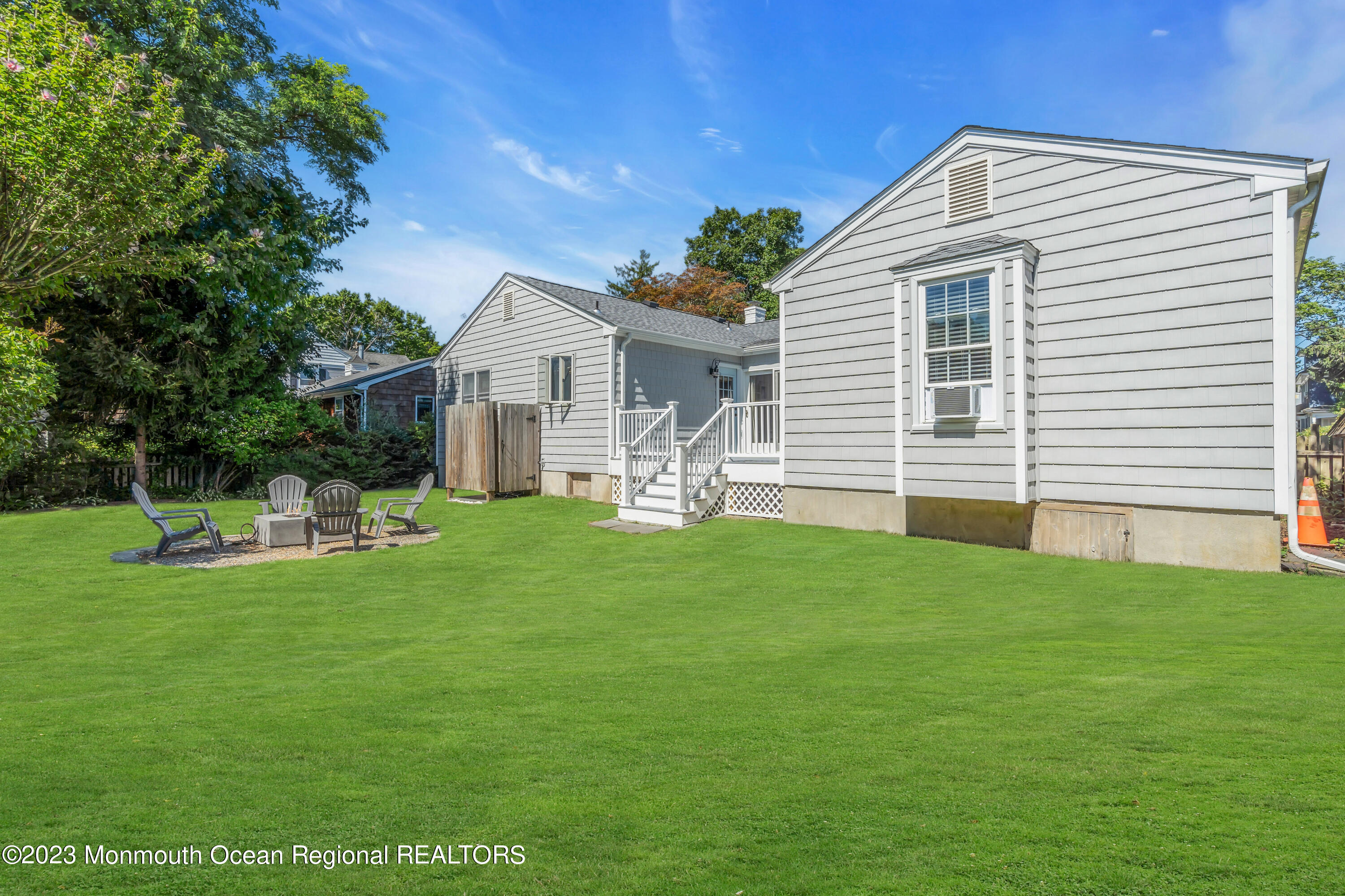 608 Brielle Avenue Brielle, NJ 08730 - Photo 34 of 56 a front view of house with a garden
