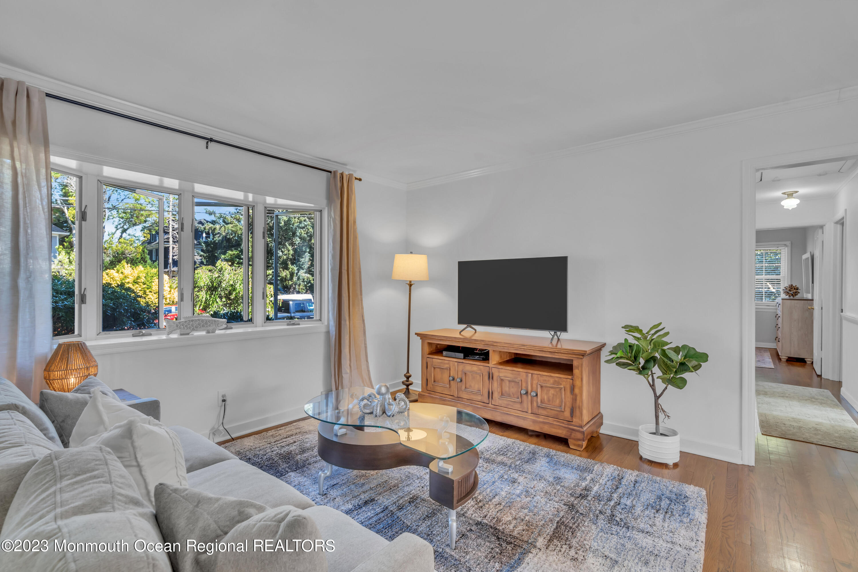 608 Brielle Avenue Brielle, NJ 08730 - Photo 7 of 56 a living room with furniture and a flat screen tv