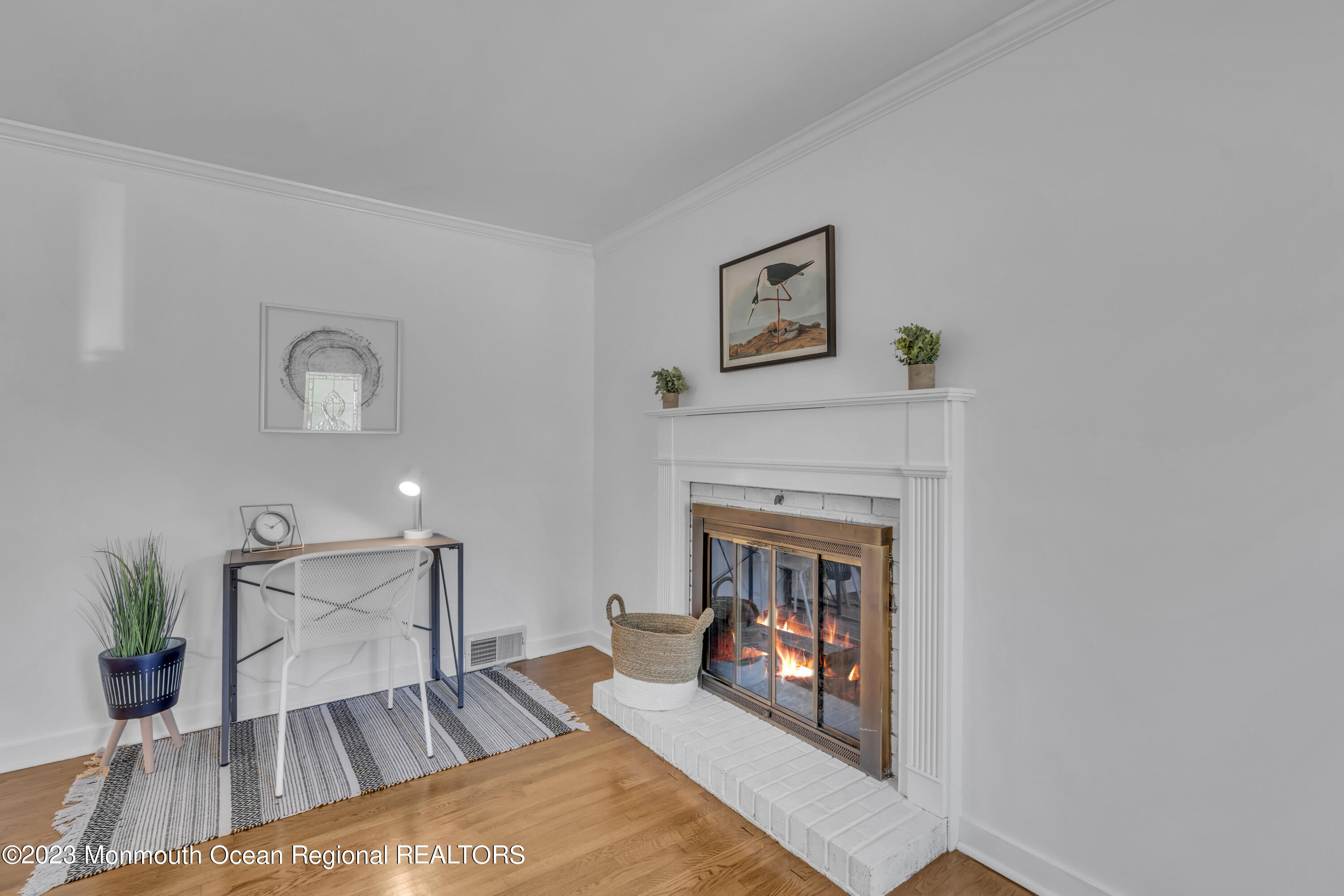 608 Brielle Avenue Brielle, NJ 08730 - Photo 8 of 56 a living room with furniture and a fireplace