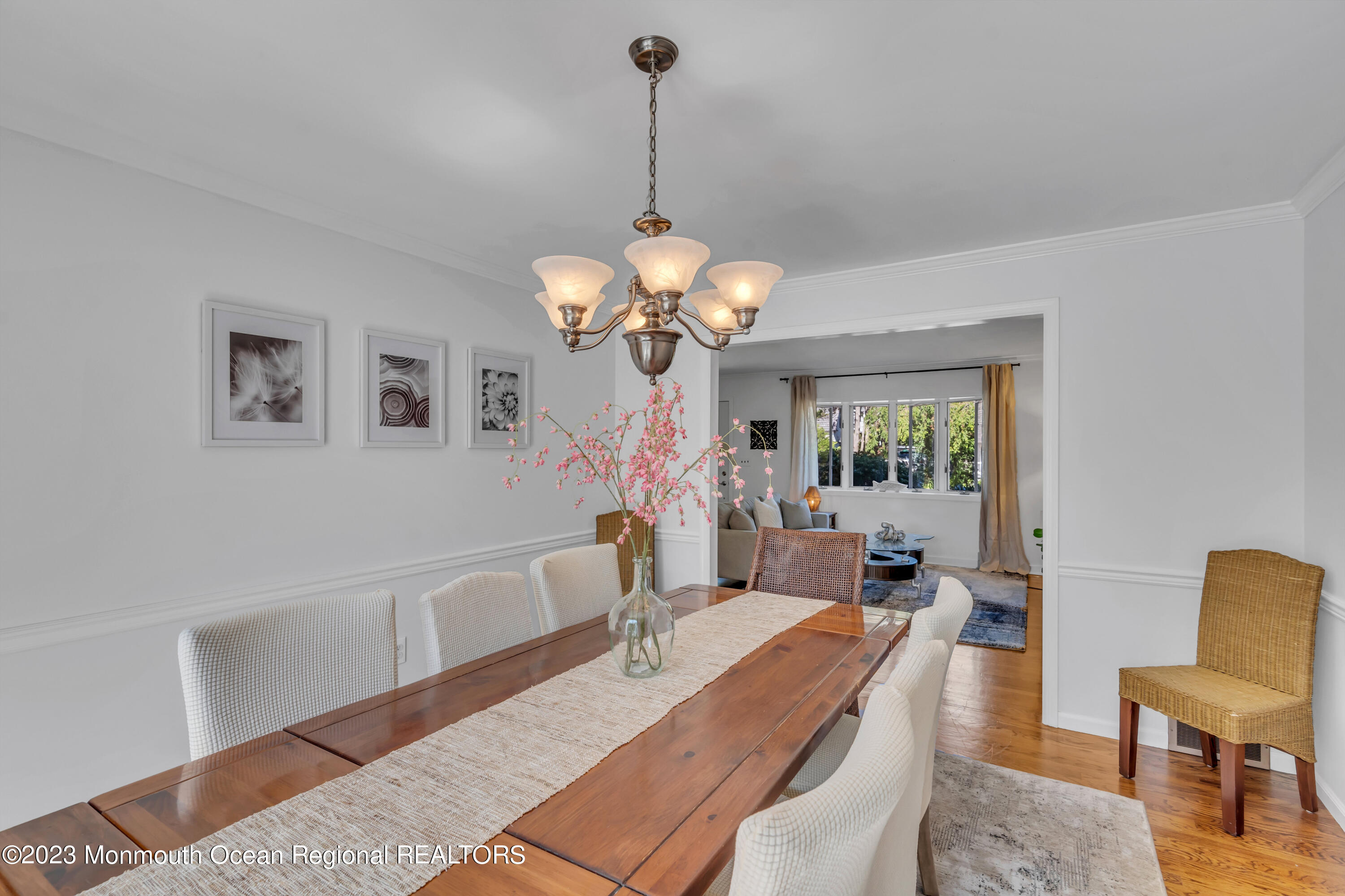 608 Brielle Avenue Brielle, NJ 08730 - Photo 10 of 56 a living room with furniture chandelier and a table