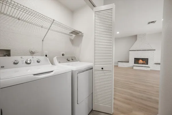 a utility room with dryer and washer
