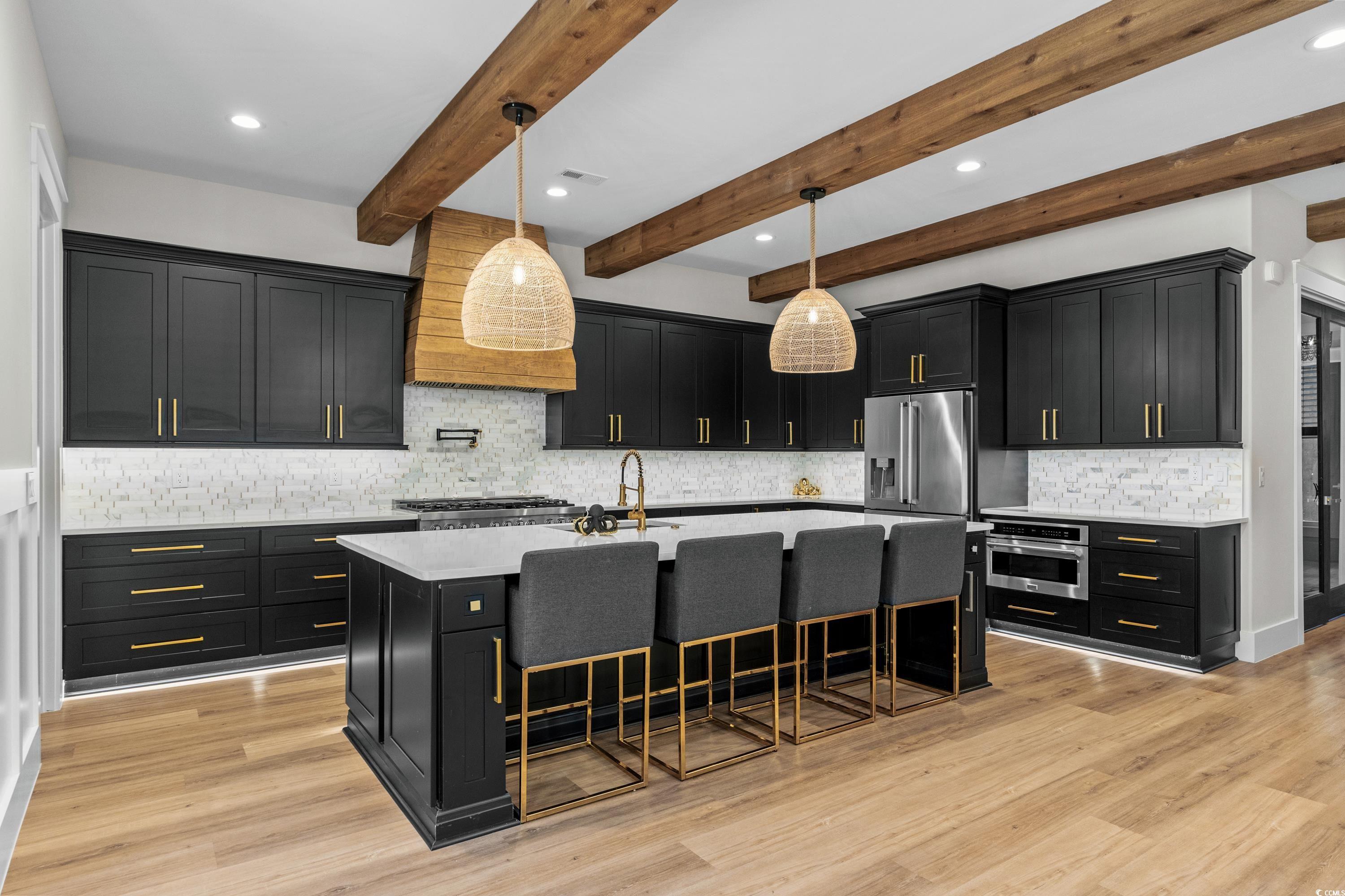 3427 Dewey Road Myrtle Beach, SC 29579 - Photo 11 of 40 Kitchen featuring stainless steel appliances, dark
