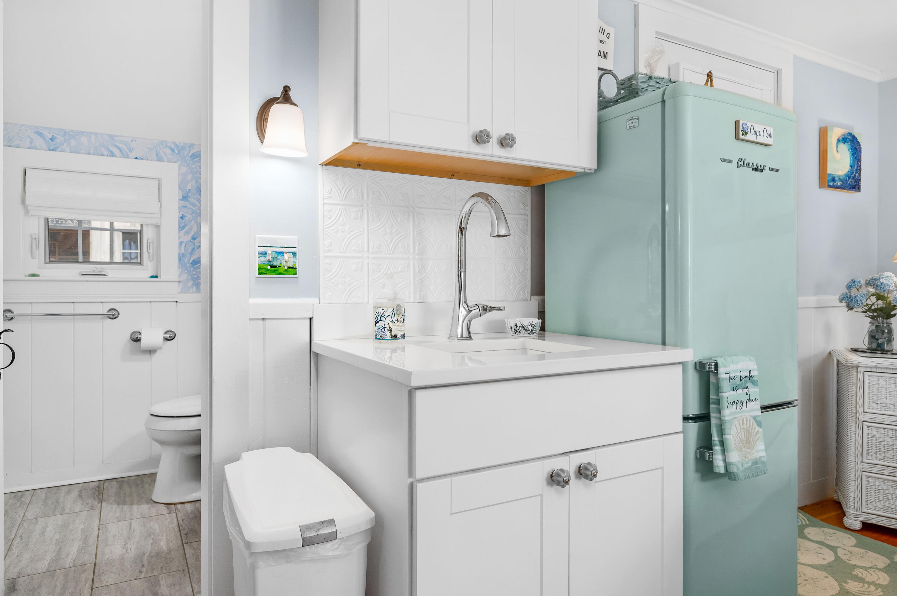 785 State Highway, Unit 9 Eastham, MA 02642 - Photo 11 of 30 a bathroom with a sink toilet and mirror