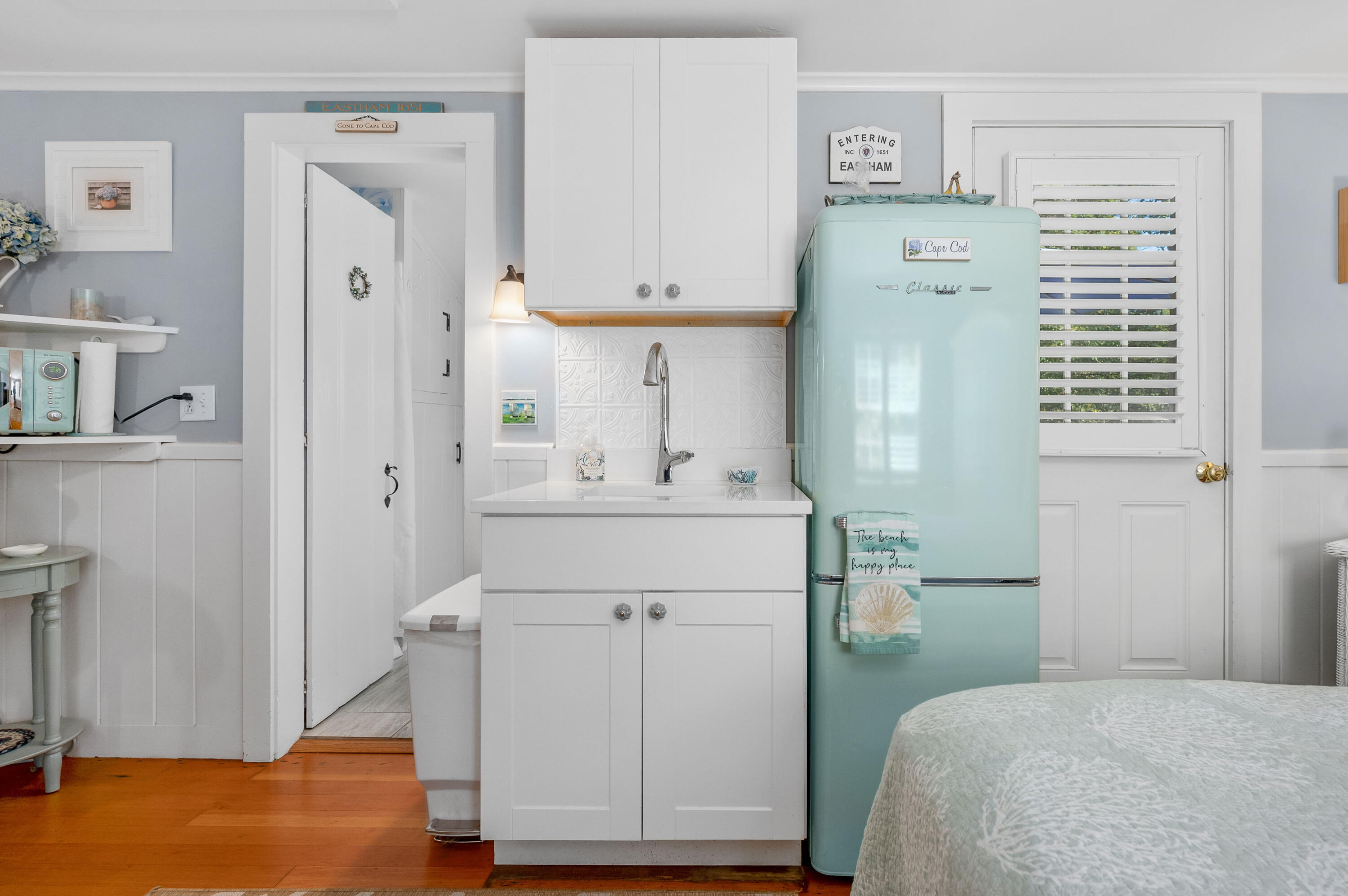 785 State Highway, Unit 9 Eastham, MA 02642 - Photo 12 of 30 a en suite bathroom with a sink and a mirror