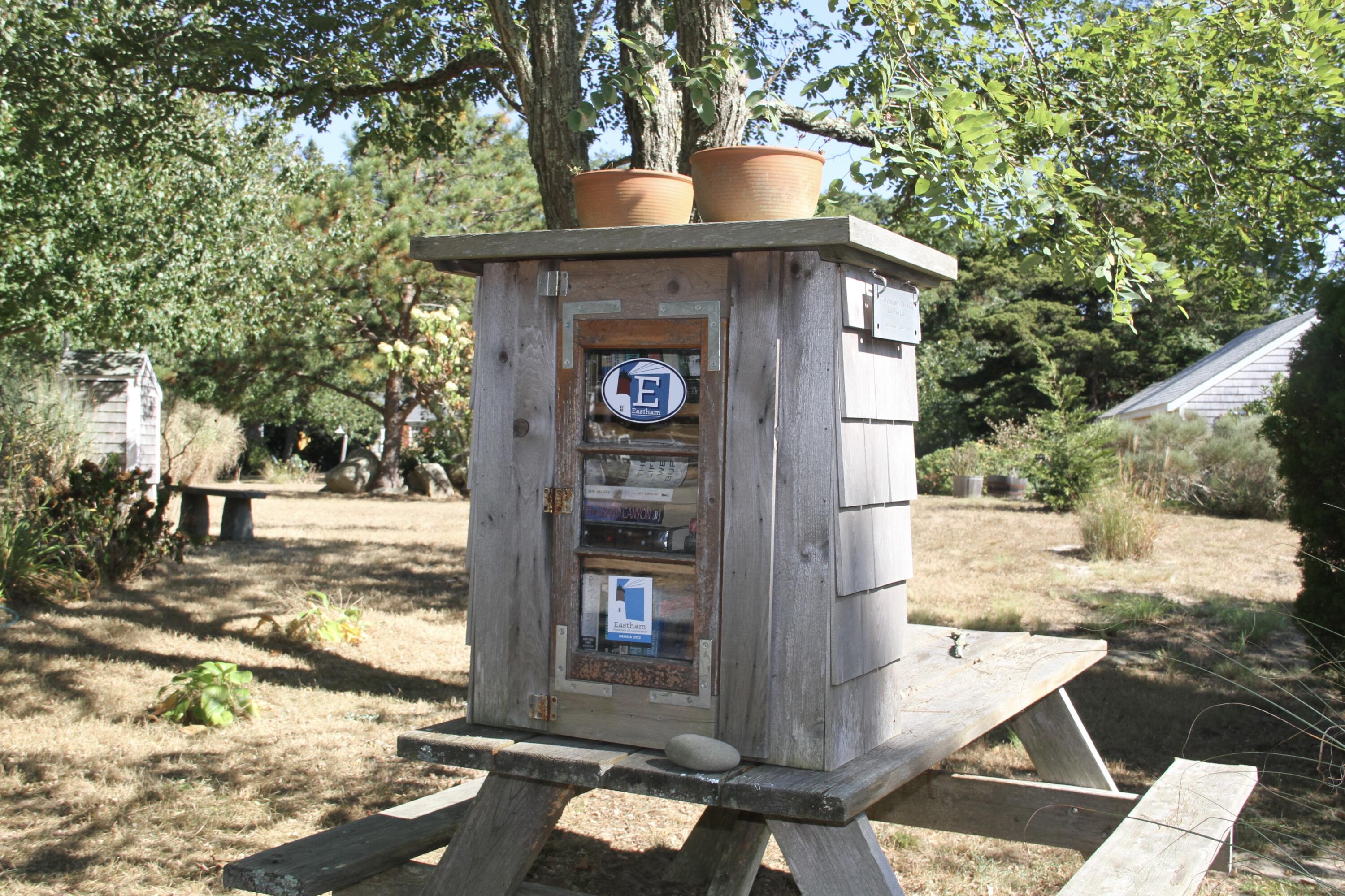 785 State Highway, Unit 9 Eastham, MA 02642 - Photo 30 of 30 a view of a house with a yard