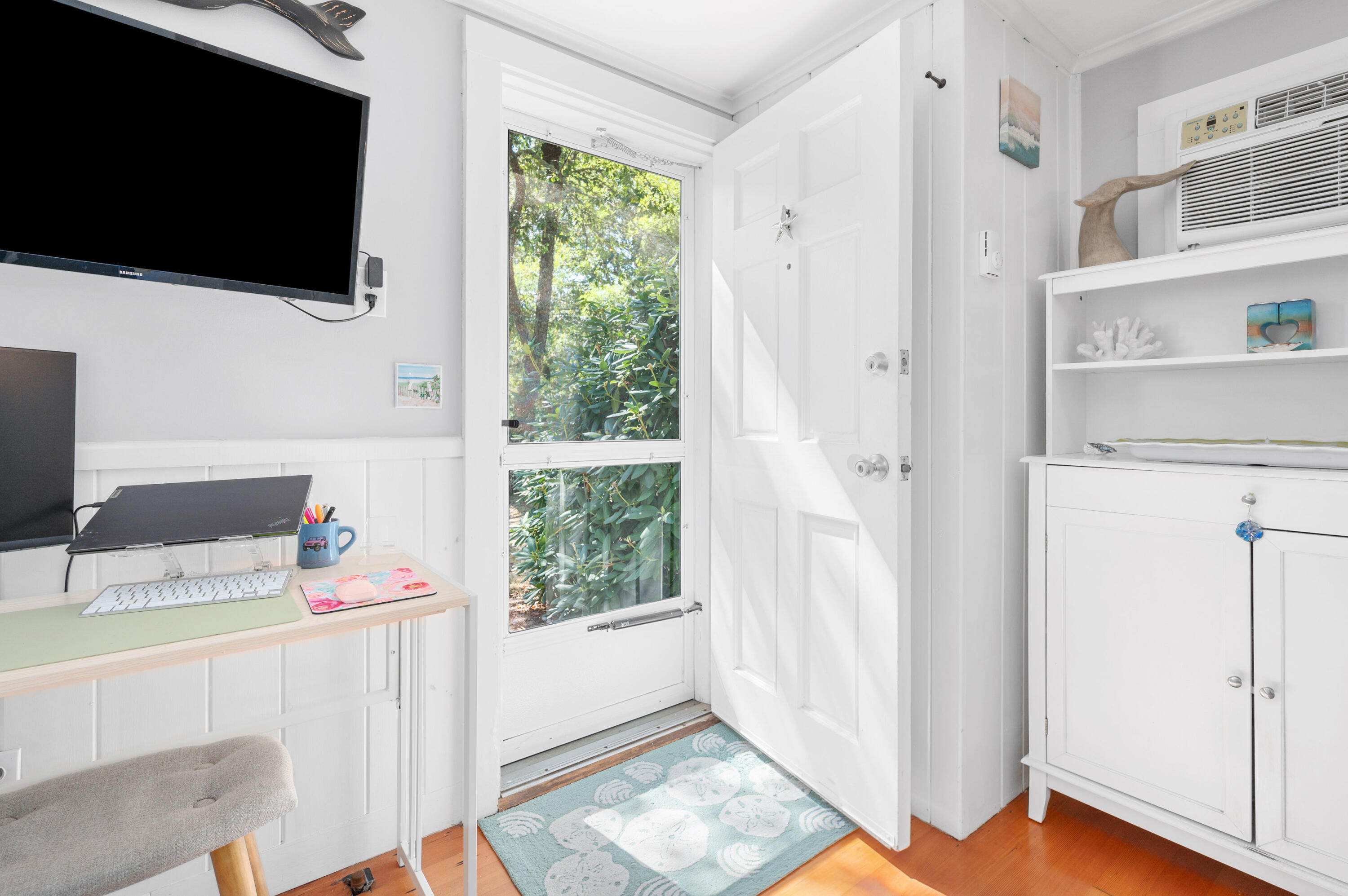 785 State Highway, Unit 9 Eastham, MA 02642 - Photo 5 of 30 a bedroom with a bed and a flat screen tv